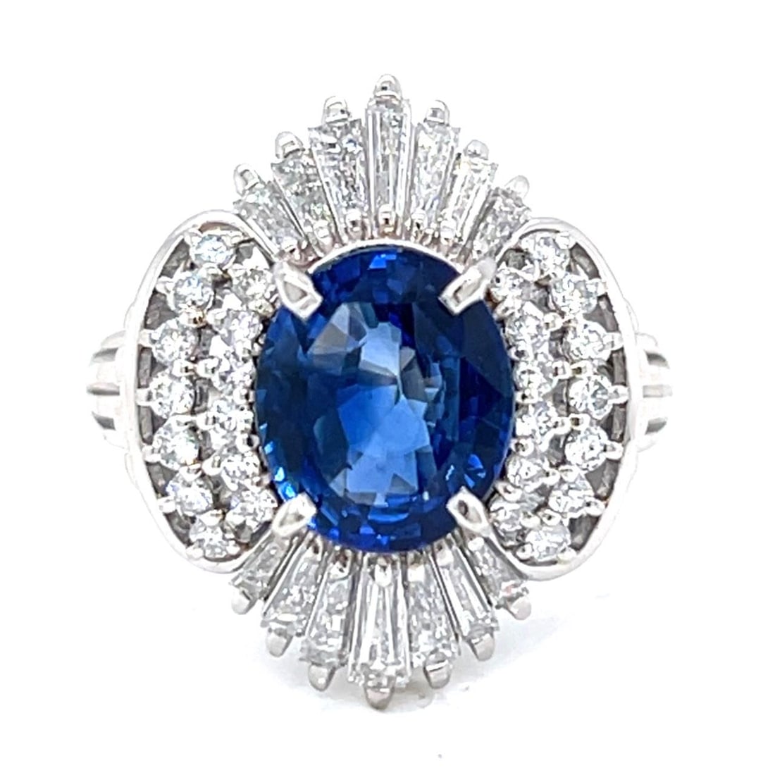 GIA Certified Platinum Ring with 2.51 Ct Sapphire and Diamond Accents: GIA Certified Platinum Ring with 2.51 Ct Sapphire and Diamond Accents This platinum ring features a 2.51 carat sapphire as its centerpiece, complemented by 0.92 carats of diamonds with G-I color and V