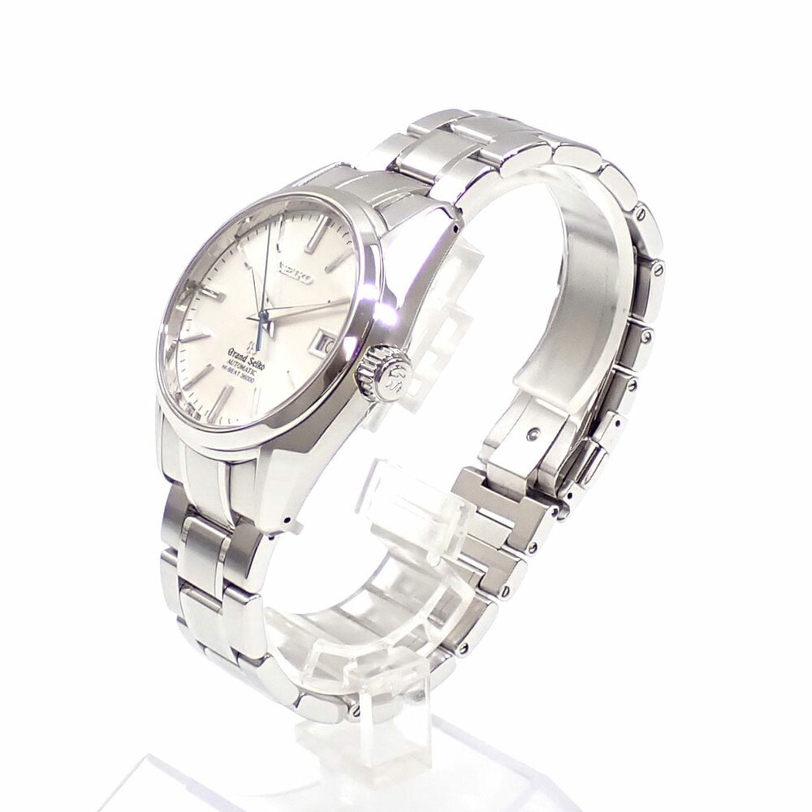 Grand Seiko men's steel watch silver dial 39mm: Grand Seiko men's steel watch silver dial 39mm This Seiko Grand Seiko wristwatch features a silver-tone steel case and bracelet, designed for a unisex fit. The watch measures 39mm in case diameter and