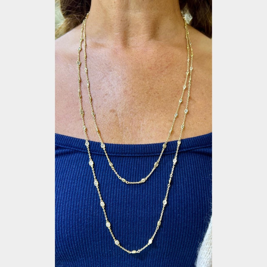 18K Yellow Gold 72 Diamonds by the Yard Necklace 54 inches: 18K Yellow Gold 72 Diamonds by the Yard Necklace 54 inches This exquisite 18K Yellow Gold necklace features an impressive total of 72 diamonds, with a combined weight of approximately 11.40 ct. The ne