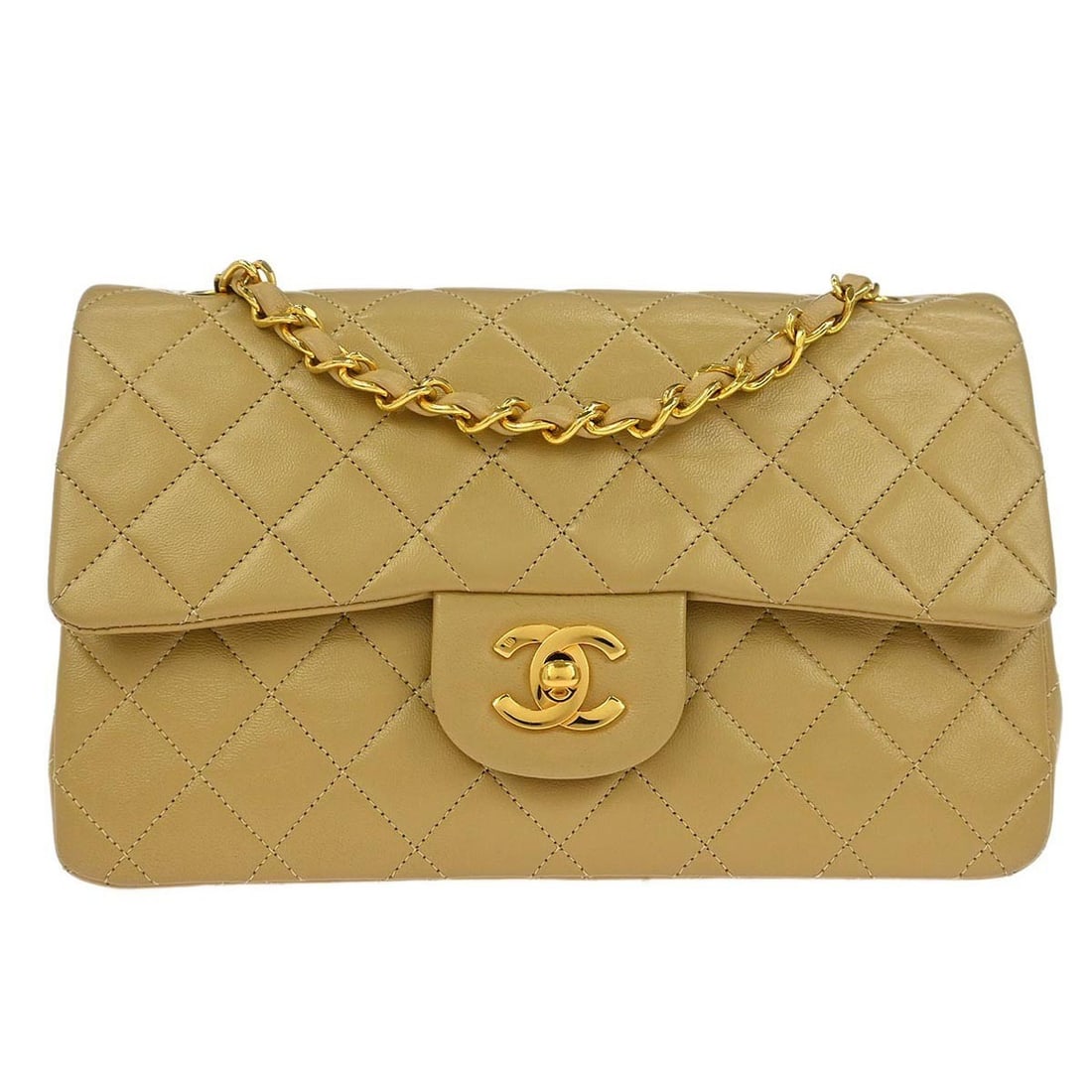 Small Classic Double Flap Shoulder Bag in Beige Lambskin by Chanel: Small Classic Double Flap Shoulder Bag in Beige Lambskin by Chanel This Chanel Classic Double Flap Small shoulder bag is crafted from beige lambskin leather with a matelasse pattern. It features a fla