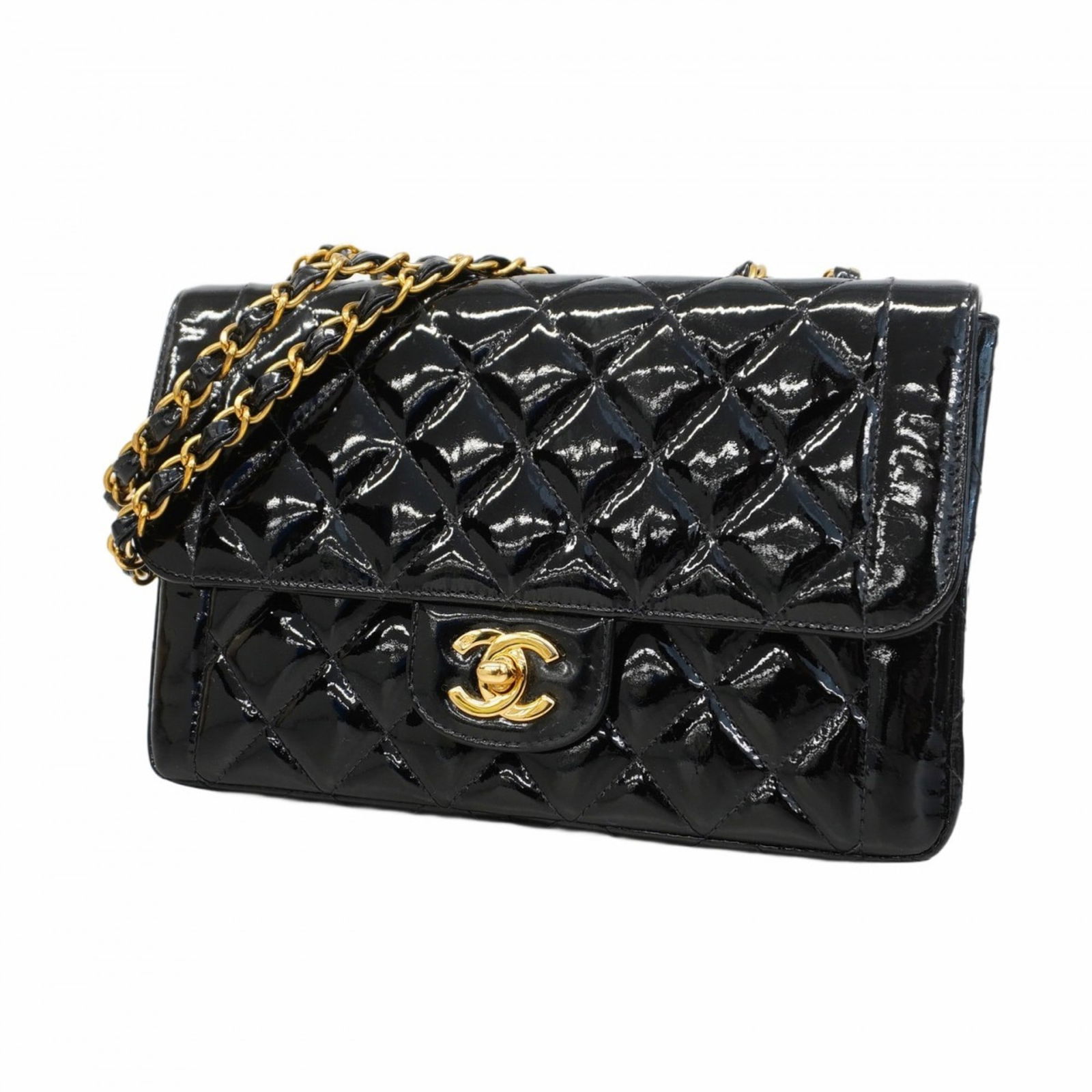 Black Patent Leather Chanel Flap Bag 15cm x 23cm x 6cm France: Black Patent Leather Chanel Flap Bag 15cm x 23cm x 6cm France This Chanel Flap bag is crafted from black patent leather and features a classic design. Made in France, it is designed for women and feat