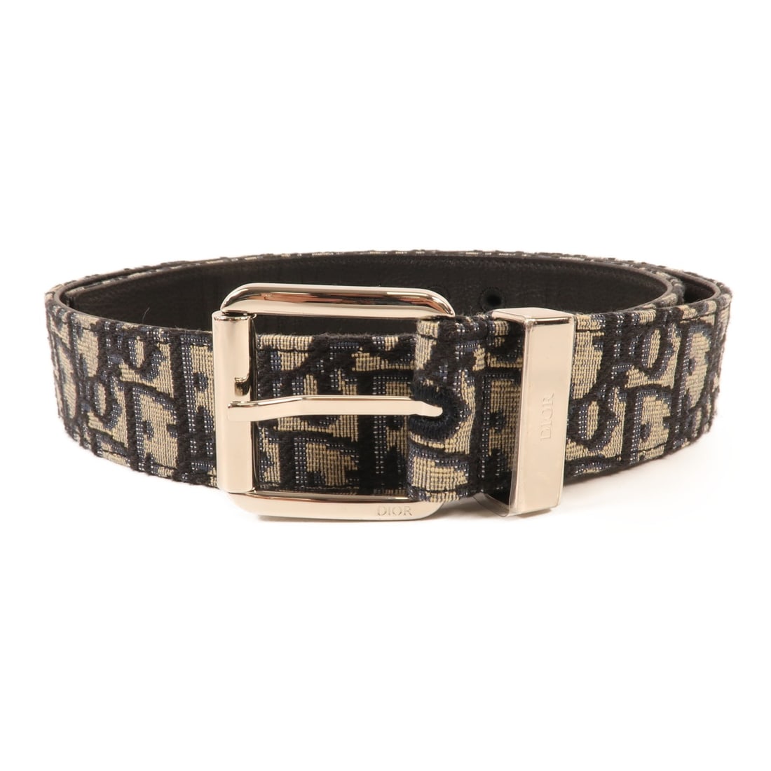 Christian Dior Blue Oblique Canvas Belt 4333: Christian Dior Blue Oblique Canvas Belt 4333 This exquisite Christian Dior belt features the iconic CD Oblique pattern in a vibrant blue canvas, blending style and sophistication. Crafted in France, t