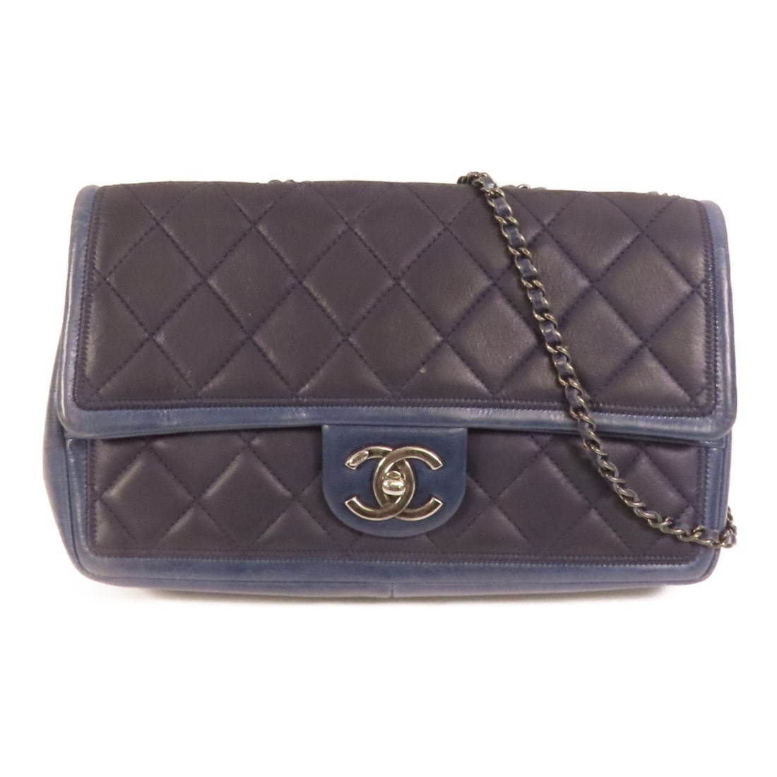 Blue Calfskin CHANEL Shoulder Bag with CC Logo and Silver Chain: Blue Calfskin CHANEL Shoulder Bag with CC Logo and Silver Chain This CHANEL shoulder bag features blue calfskin leather with signature CC detailing and silver-tone hardware. The bag offers a regular s