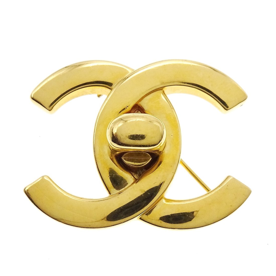 Chanel 96P Turnlock Vintage Gold-Plated Brooch Pin: Chanel 96P Turnlock Vintage Gold-Plated Brooch Pin This stunning Chanel Turnlock Brooch Pin is a remarkable vintage piece, showcasing a luxurious gold-plated finish. Designed with elegance in mind, it
