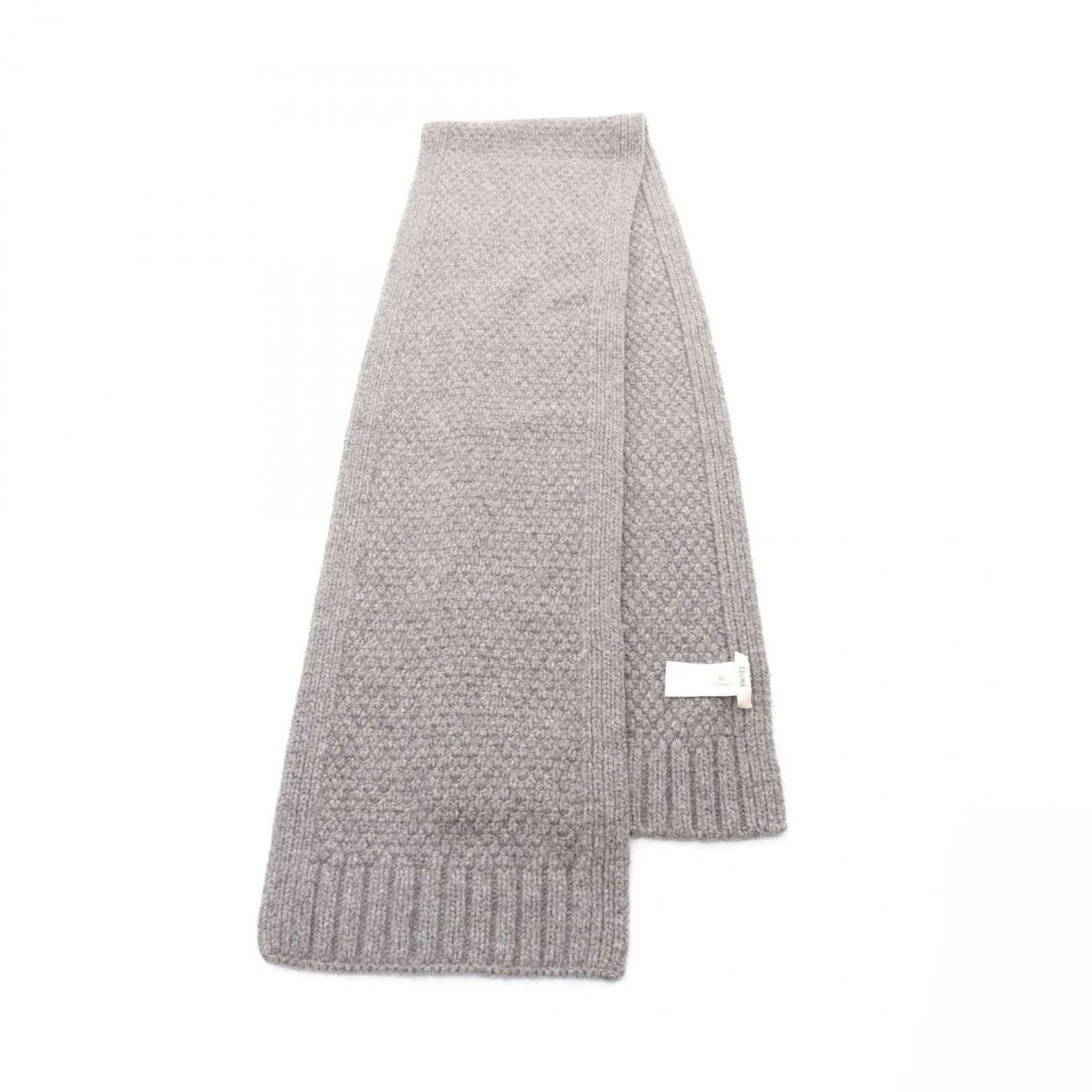 Grey cashmere scarf by Celine made in Italy 27 cm x 190 cm: Grey cashmere scarf by Celine made in Italy 27 cm x 190 cm This Celine scarf is crafted from luxurious grey cashmere and offers a soft, elegant accessory suitable for all genders. Made in Italy, it fe