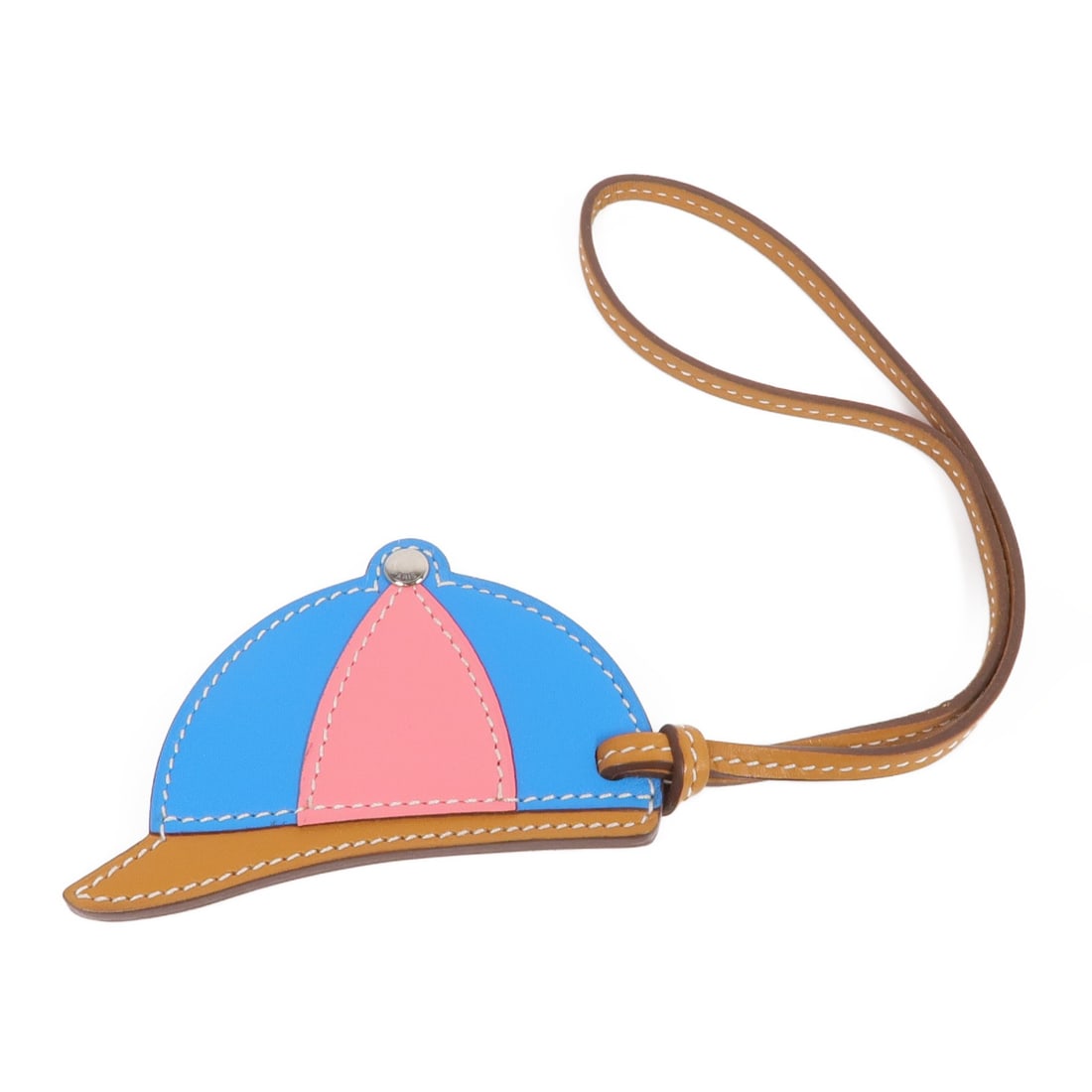 HERMES Paddock Bombe Charm Pink Blue Swift Leather: HERMES Paddock Bombe Charm Pink Blue Swift Leather This exquisite HERMES Paddock Bombe Charm is crafted from premium calfskin leather, showcasing a delightful combination of pink and blue colors. Desi