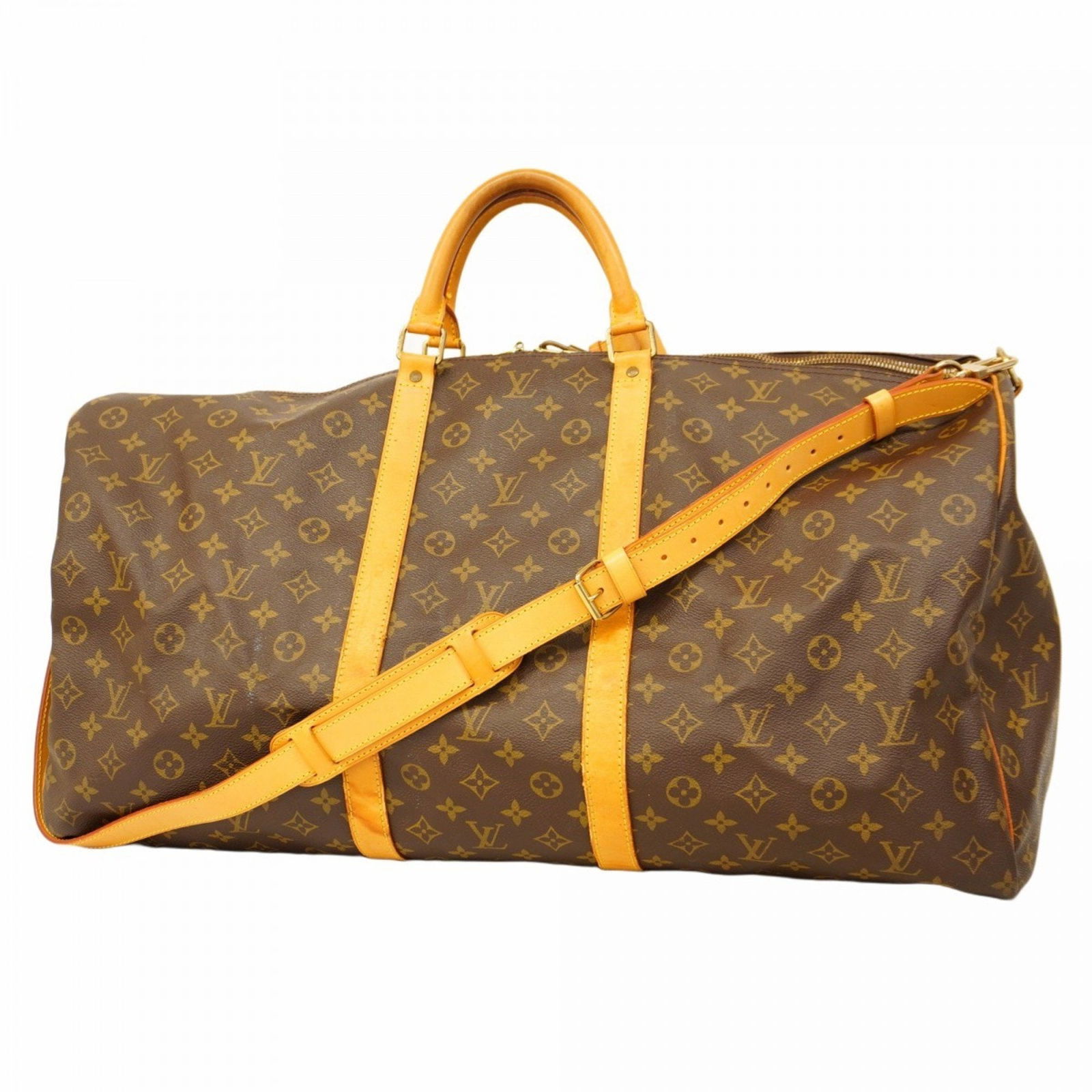 Brown Canvas Louis Vuitton Keepall Bandouliere 60 Travel Bag France: Brown Canvas Louis Vuitton Keepall Bandouliere 60 Travel Bag France The Louis Vuitton Keepall Bandouliere 60 is crafted from brown canvas and designed for versatile, unisex use. This spacious travel b