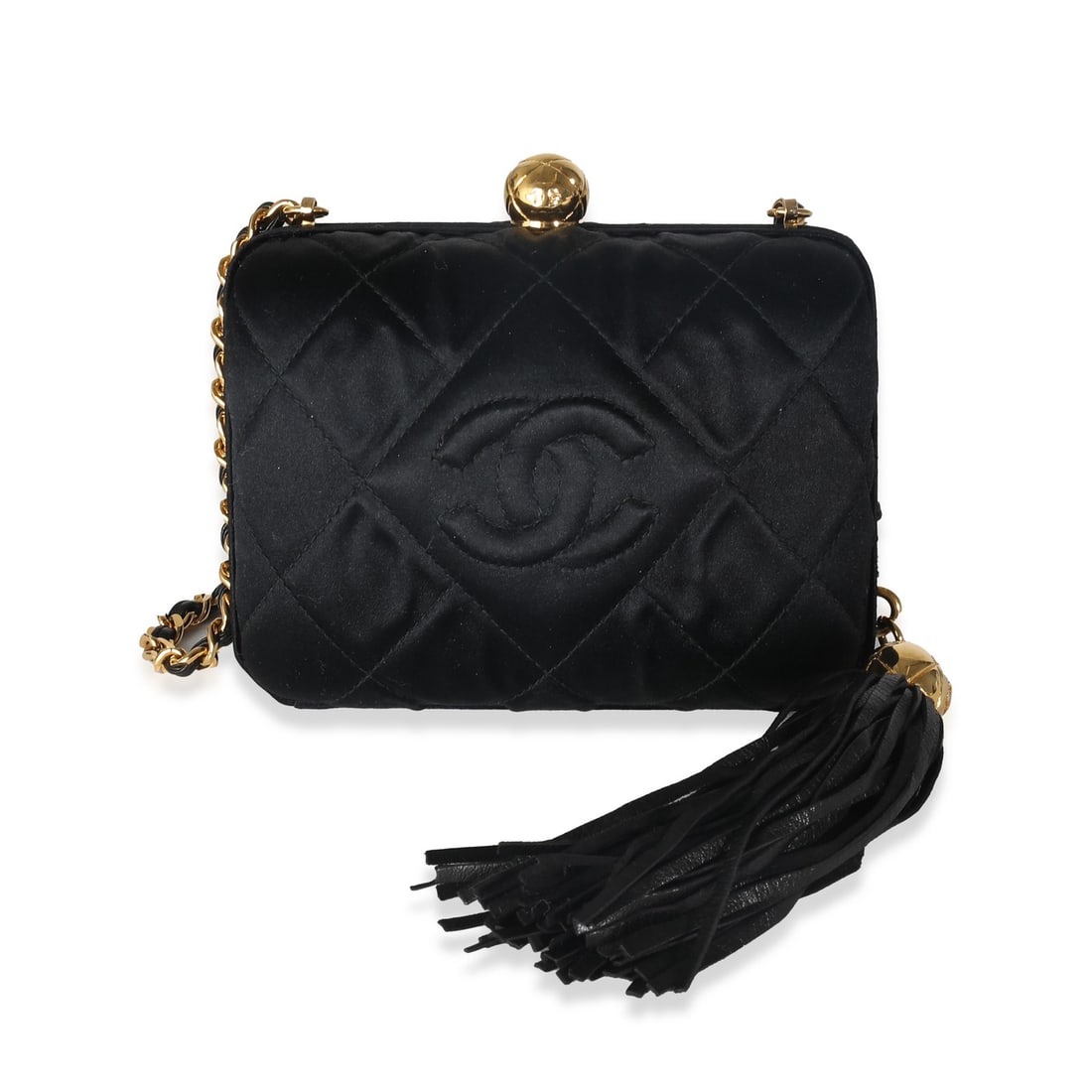 Chanel CC Tassel Box Clutch Black Satin Vintage 1991-1994: Chanel CC Tassel Box Clutch Black Satin Vintage 1991-1994 This elegant Chanel Black Quilted Satin CC Tassel Box Clutch is a sophisticated addition to any evening ensemble. Crafted from soft fabric, th