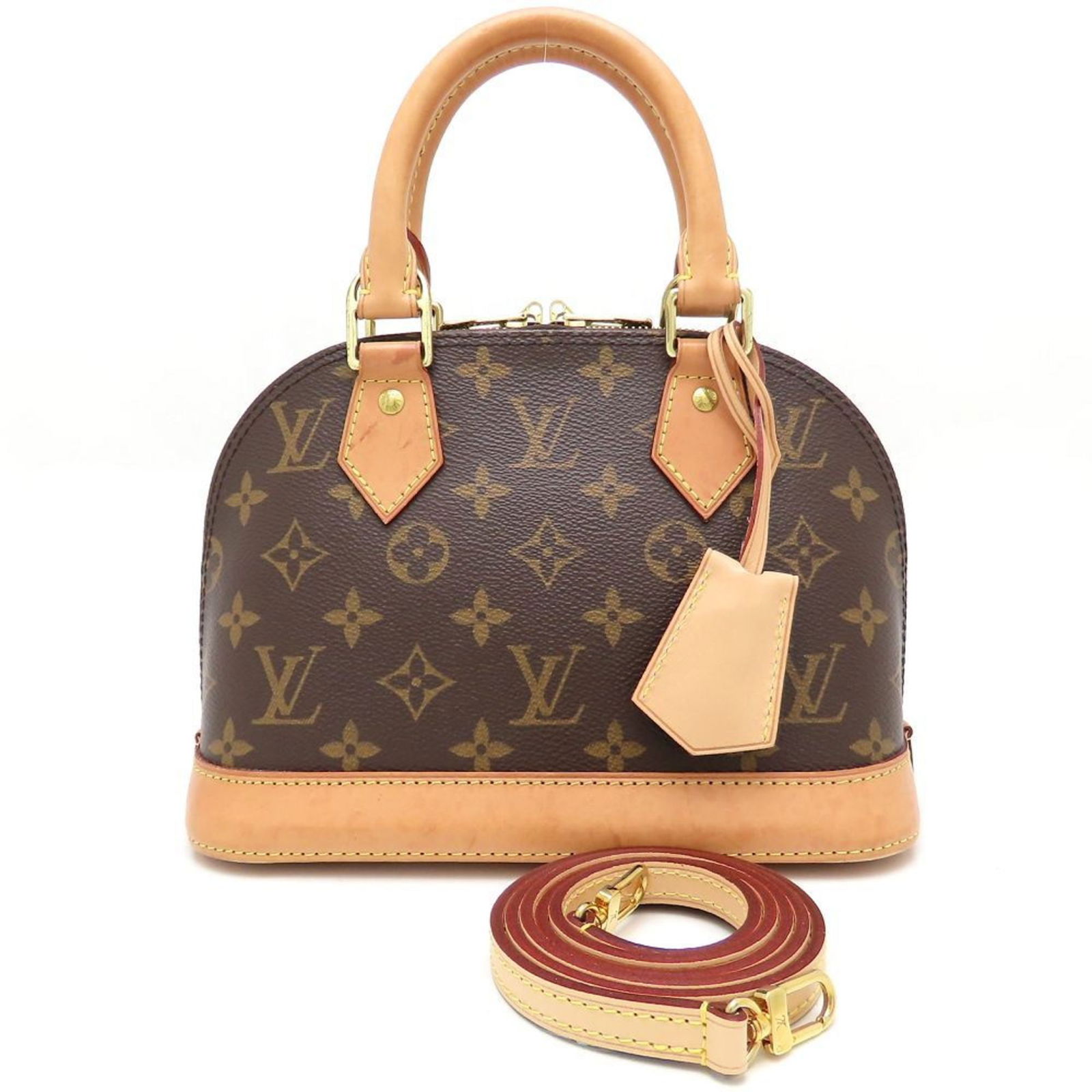 Louis Vuitton Alma BB Brown Canvas Small Satchel Handbag France: Louis Vuitton Alma BB Brown Canvas Small Satchel Handbag France This Louis Vuitton Alma BB handbag features a brown canvas exterior and is designed for women. It is made in France and showcases the ic