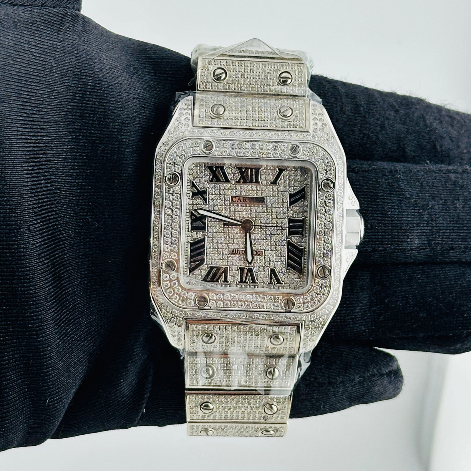 Aftermarket Diamond Roman Dial Cartier Santos 100 XL Ref 3774 Mens Watch: Aftermarket Diamond Roman Dial Cartier Santos 100 XL Ref 3774 Mens Watch This Cartier Santos 100 XL features a diamond Roman dial and a diamond bezel, offering a luxurious and striking appearance. The