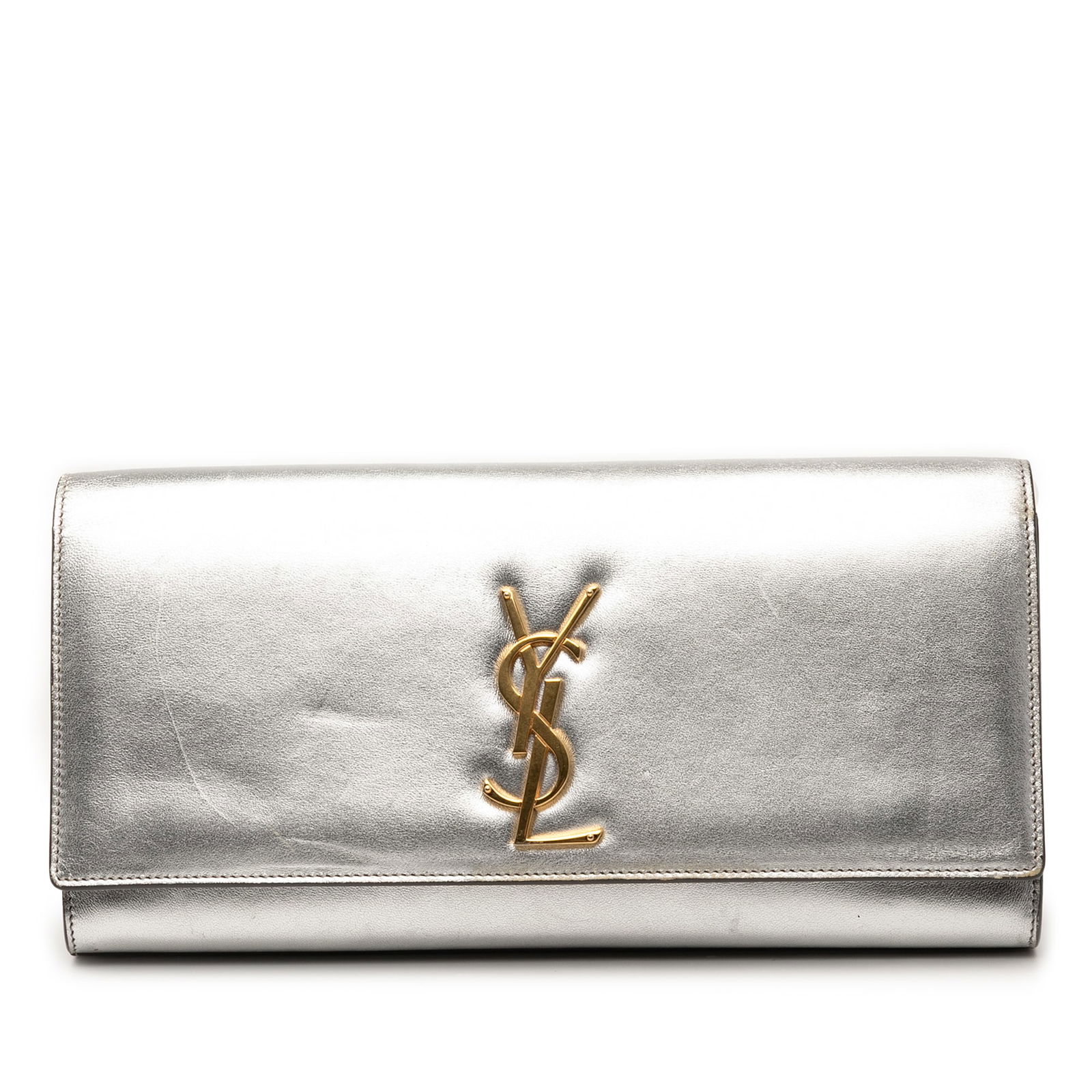 Silver Leather Cassandre Clutch Bag by Saint Laurent: Silver Leather Cassandre Clutch Bag by Saint Laurent This Saint Laurent clutch features a metallic leather exterior in silver with a front flap and magnetic closure. The interior includes a slip pocke