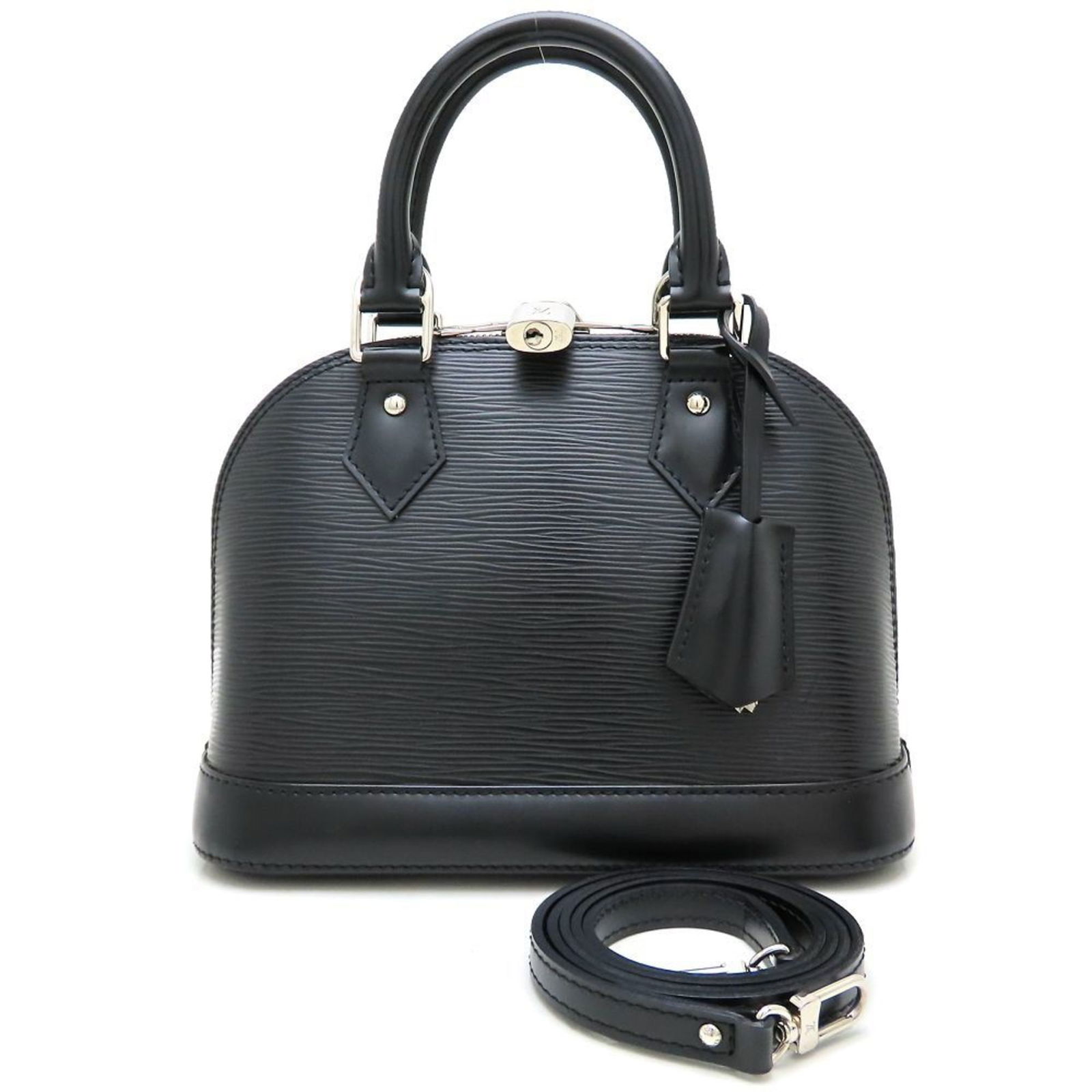 Louis Vuitton Alma BB Black Leather Small Handbag France: Louis Vuitton Alma BB Black Leather Small Handbag France This Louis Vuitton Alma BB handbag features a black leather exterior and is crafted for women. The bag has some traces of usage and minor scrat