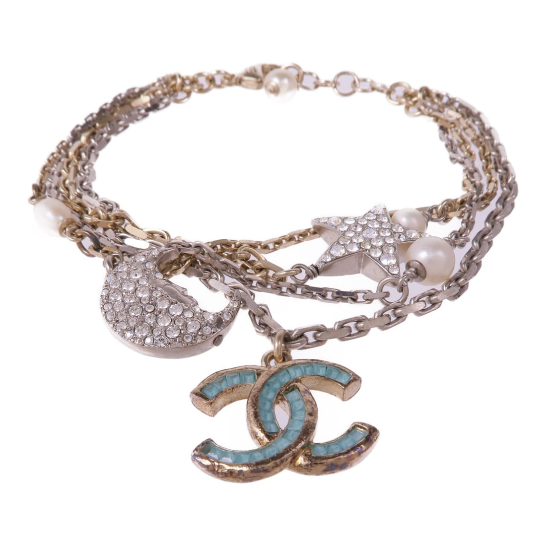 CHANEL Gold Silver CC Bracelet France: CHANEL Gold Silver CC Bracelet France This exquisite CHANEL CC Bracelet features a luxurious gold tone, perfect for adding a touch of elegance to any outfit. Crafted in France, this bracelet showcases