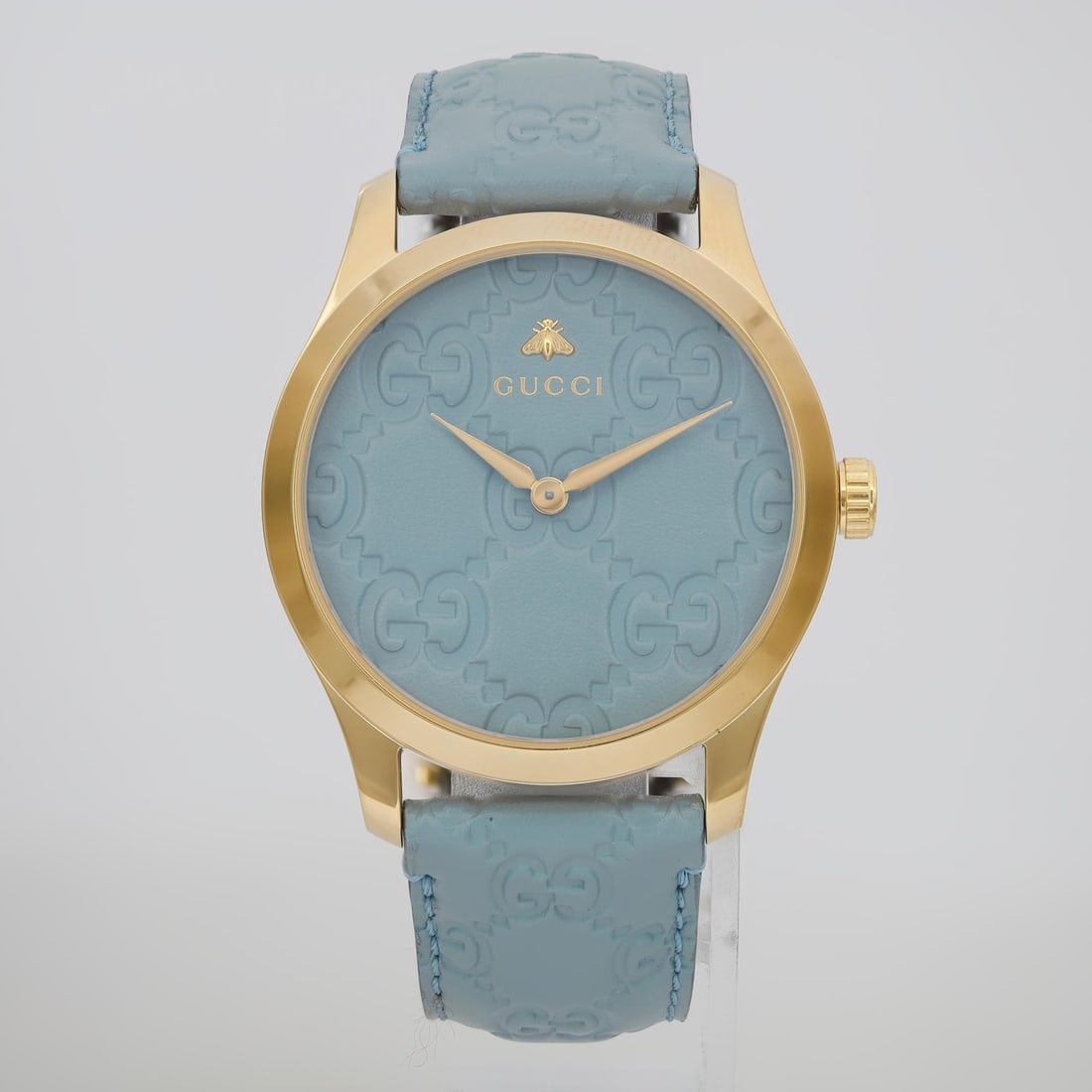 Gucci G-Timeless Blue Dial Gold Plated Ladies Watch YA1264097: Gucci G-Timeless Blue Dial Gold Plated Ladies Watch YA1264097 This elegant Gucci G-Timeless ladies' wristwatch combines a striking blue dial with a luxurious gold-plated stainless steel case and band.