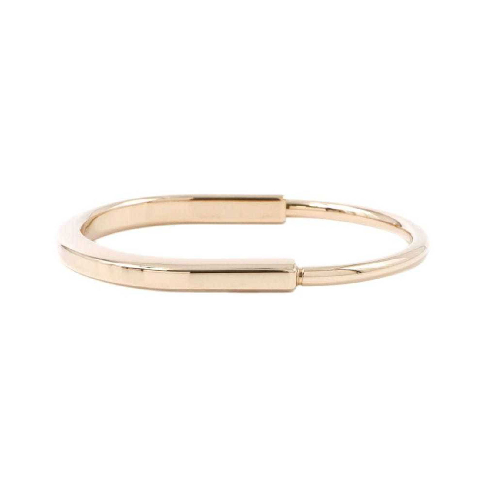 Rose Gold Lock Bracelet by Tiffany & Co 17.5cm: Rose Gold Lock Bracelet by Tiffany & Co 17.5cm This Tiffany & Co. Lock bracelet is crafted from rose gold and designed for women. It features a gold color and a polished finish. The main body shows sl
