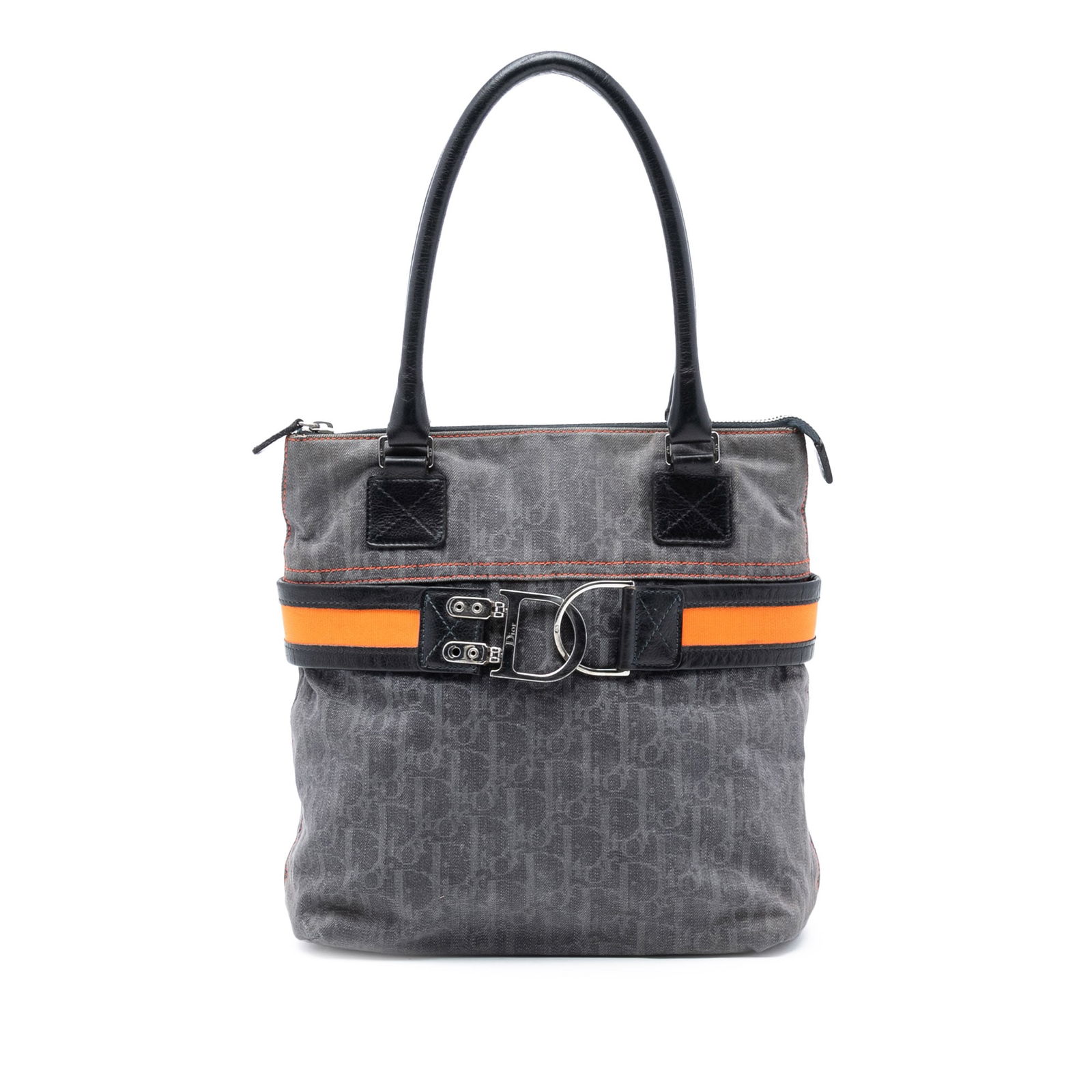 Blue Denim Tote Bag Dior Diorissimo Trotter Model with Leather Trim: Blue Denim Tote Bag Dior Diorissimo Trotter Model with Leather Trim This Diorissimo Trotter Denim Flight Tote features a blue denim body with leather trim, rolled leather handles, a top zip closure, a
