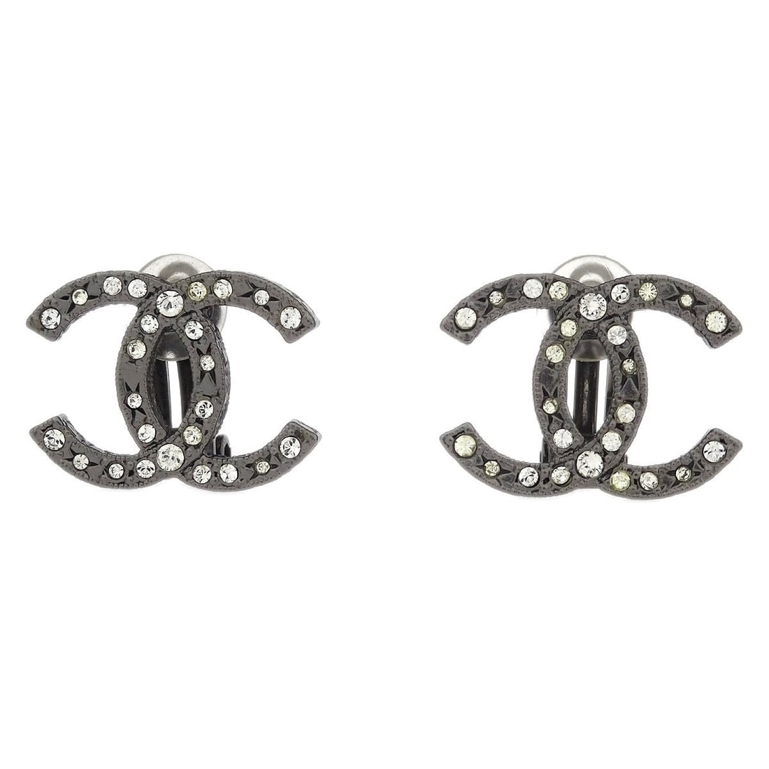 Chanel CC Clip-On Earrings Silver Plated with Rhinestones: Chanel CC Clip-On Earrings Silver Plated with Rhinestones Elevate your accessory collection with these stunning Chanel CC Clip-On Earrings. Featuring a classic button style, these earrings are adorned