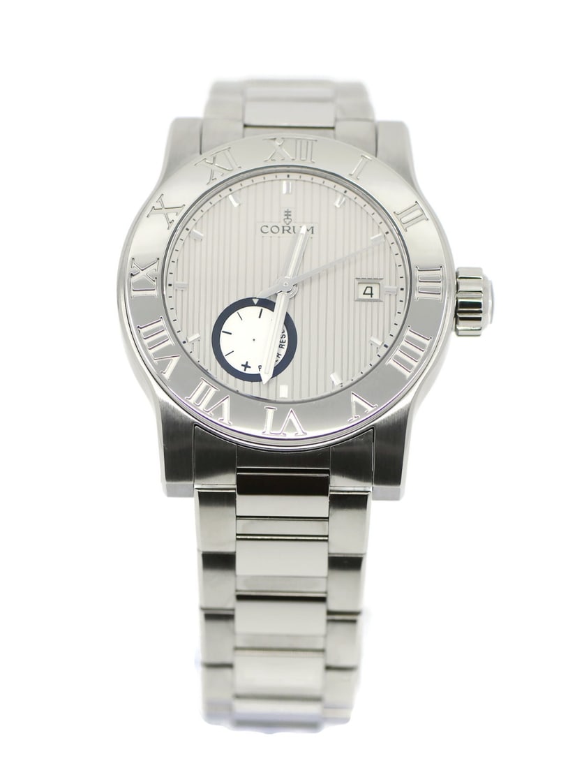 Corum Romulus Power Reserve Automatic Stainless Steel Wristwatch 02.0001 With Box: Corum Romulus Power Reserve Automatic Stainless Steel Wristwatch 02.0001 With Box The Corum Romulus Power Reserve is a sophisticated wristwatch featuring a mechanical automatic movement. Crafted from