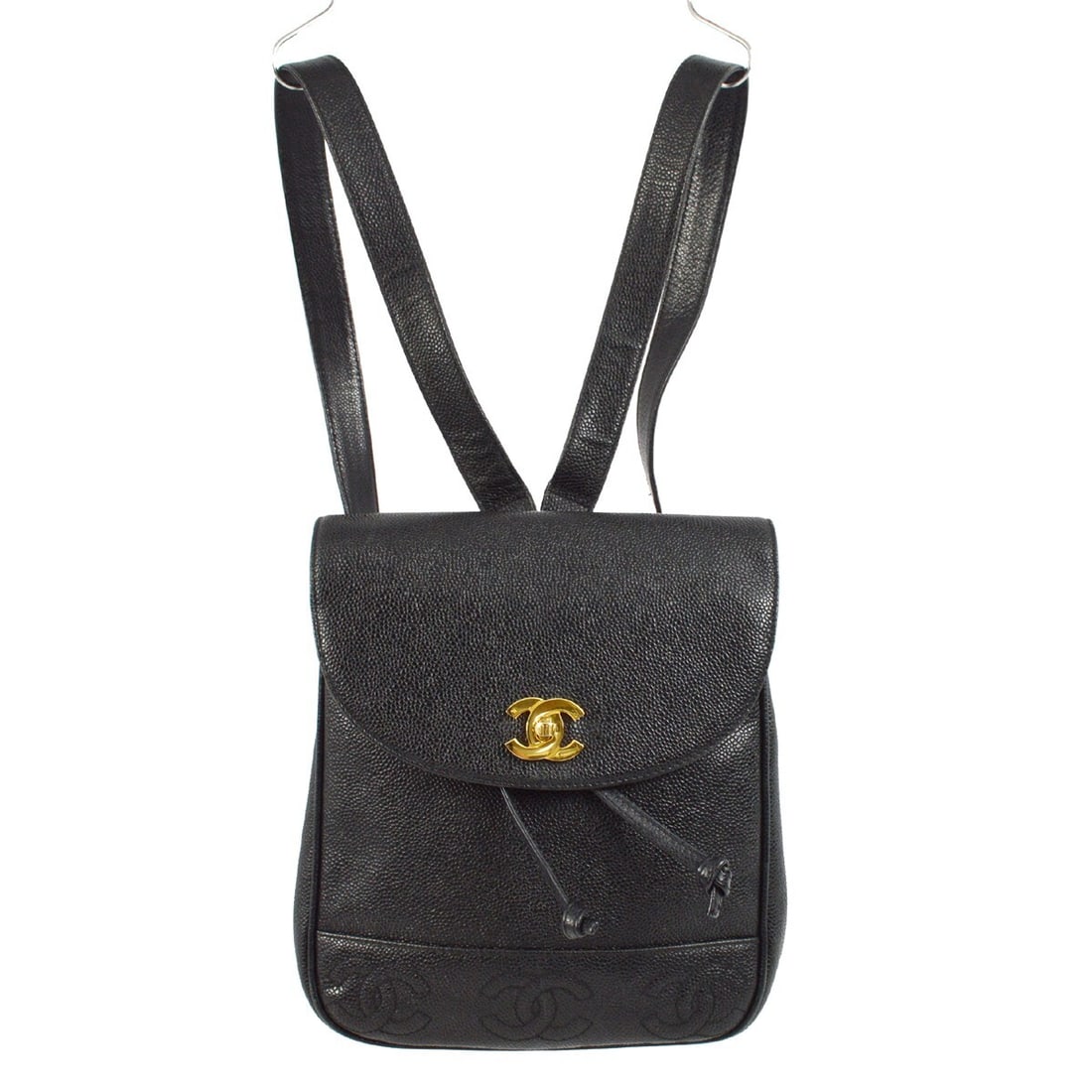 Black Caviar Leather Triple CC Chanel Medium Backpack with Drawstring Turnlock: Black Caviar Leather Triple CC Chanel Medium Backpack with Drawstring Turnlock This Chanel backpack features black caviar skin leather with a triple CC logo accent and a drawstring turnlock closure. I