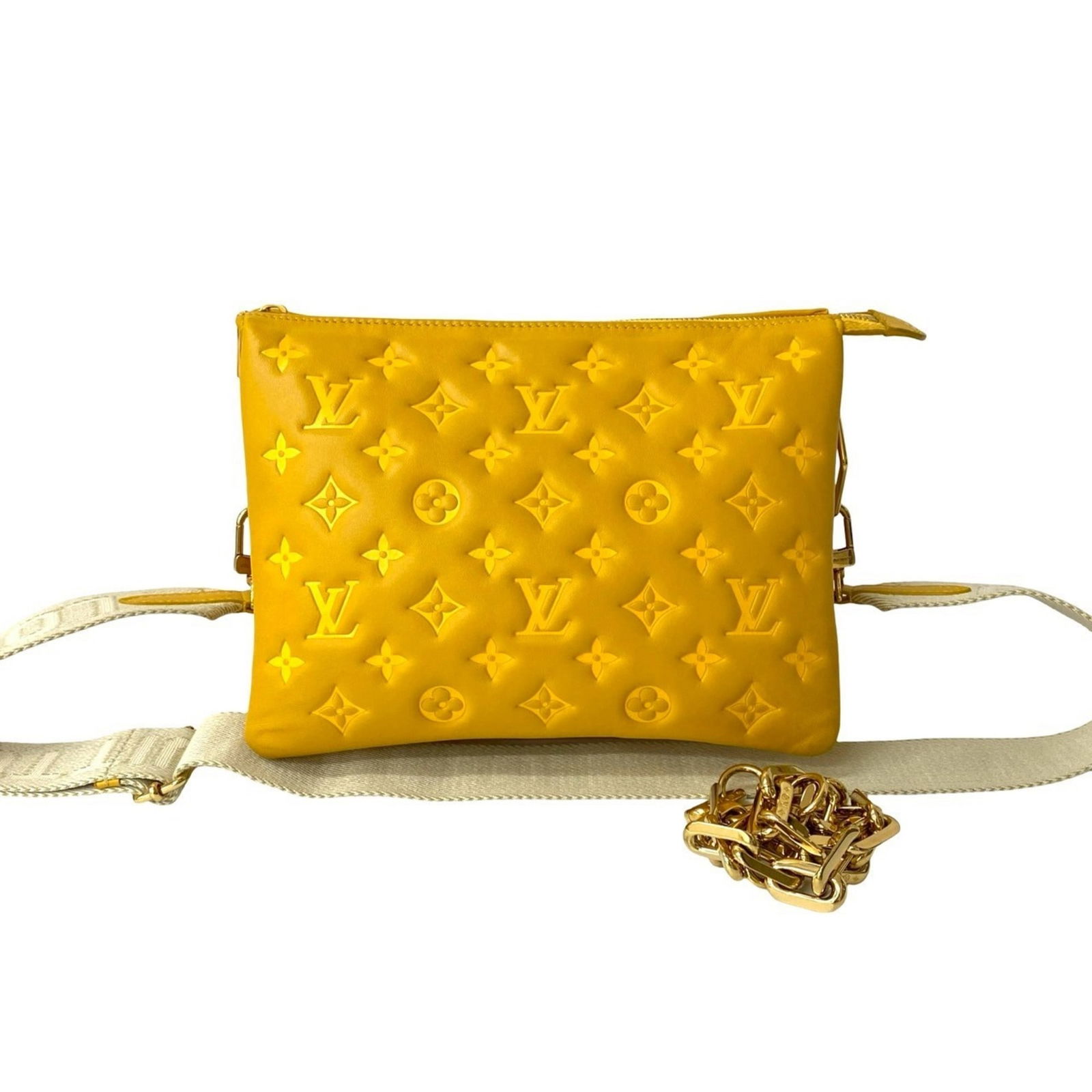 Yellow Leather Louis Vuitton Coussin Bag 20cm x 26.5cm x 12cm: Yellow Leather Louis Vuitton Coussin Bag 20cm x 26.5cm x 12cm The Louis Vuitton Coussin is a women's handbag crafted from yellow leather. It features a sleek and structured design with spacious interi