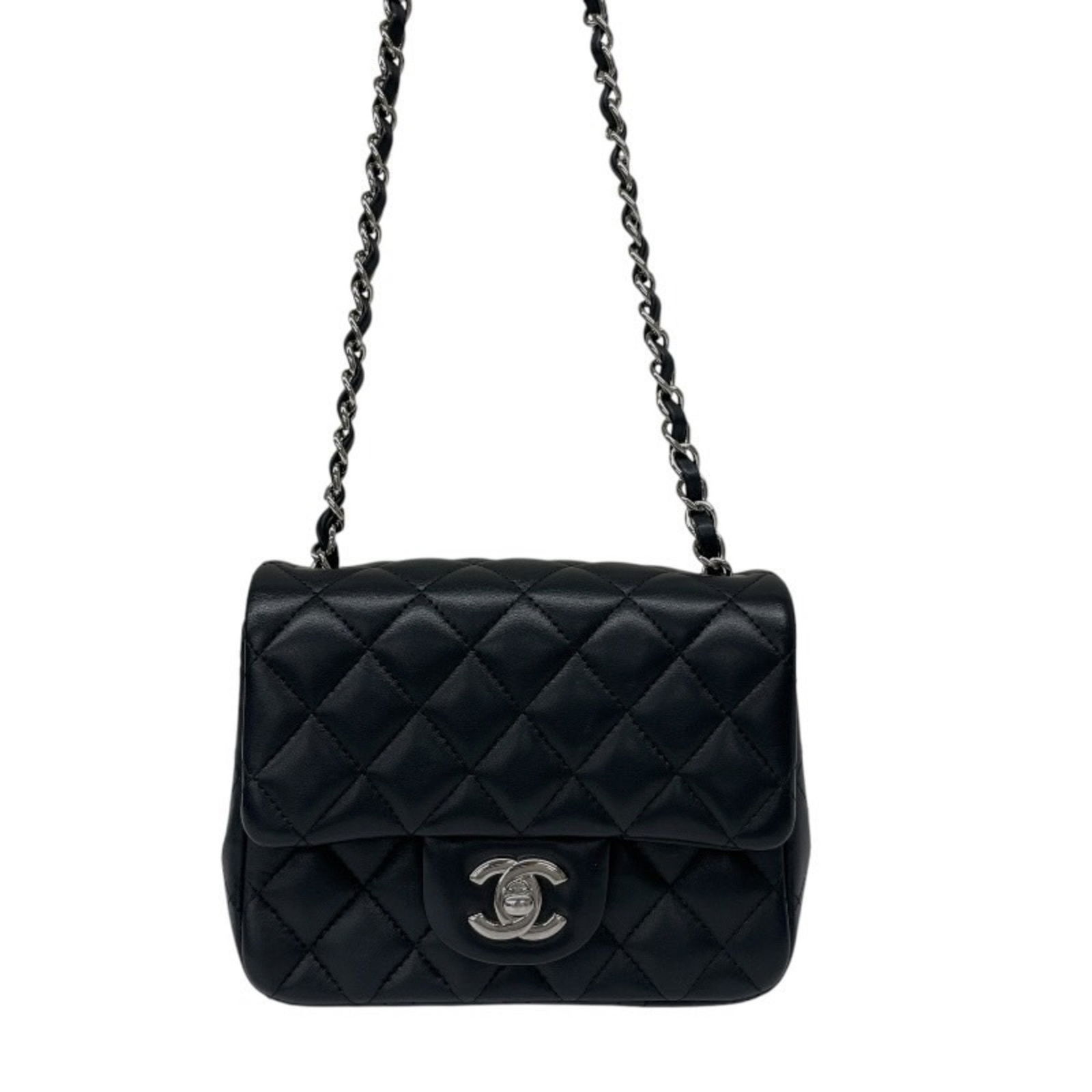 Black Leather Chanel Mini Flap Shoulder Bag from France: Black Leather Chanel Mini Flap Shoulder Bag from France This Chanel Mini Flap Bag features a black leather exterior and a compact silhouette. The bag is designed for women and crafted in France. It sh
