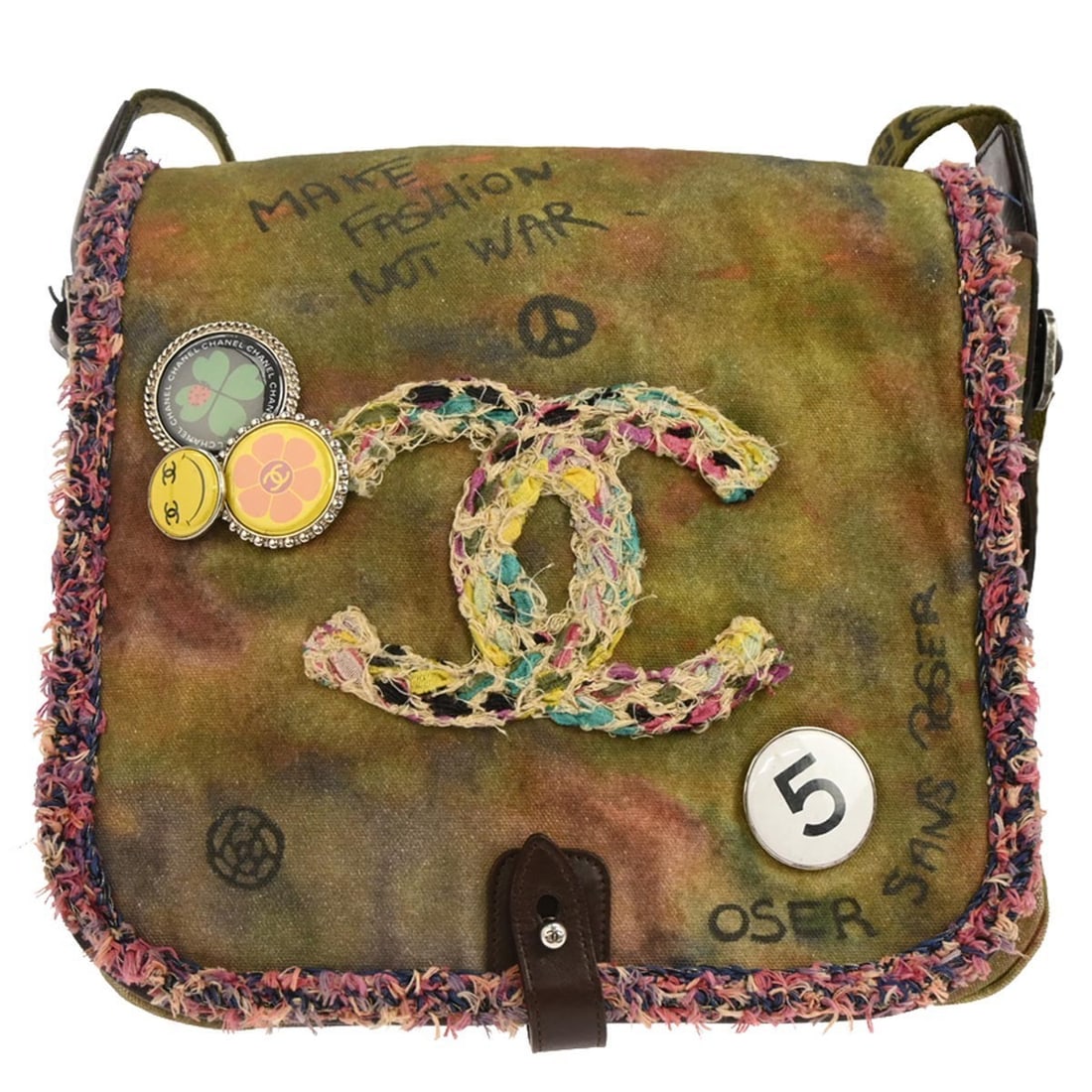 Chanel On The Pavements Khaki Canvas Shoulder Bag with Flap Closure: Chanel On The Pavements Khaki Canvas Shoulder Bag with Flap Closure This Chanel Khaki Canvas Graffiti On The Pavements shoulder bag features a medium-sized silhouette with a khaki canvas and leather e