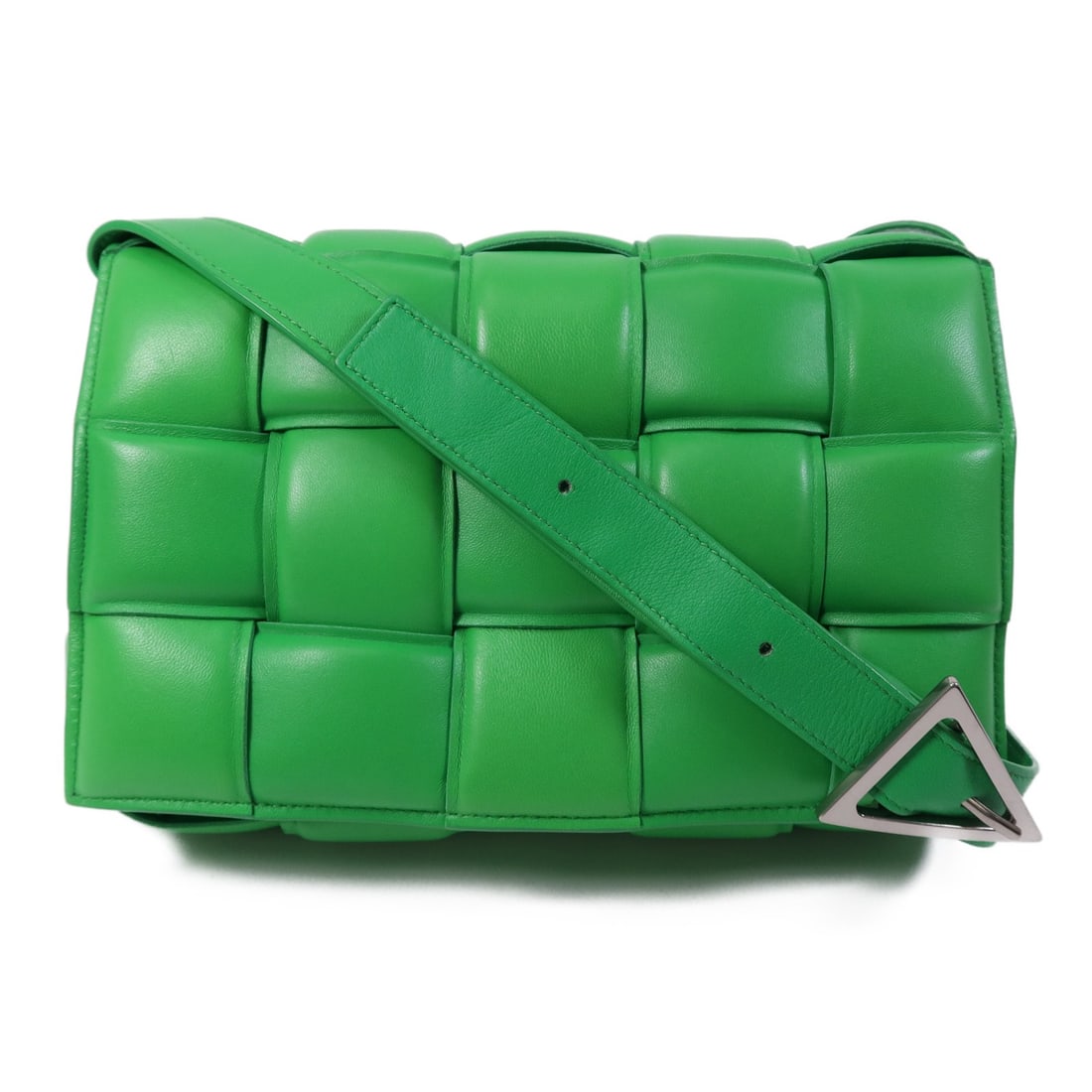 BOTTEGA VENETA Green Padded Casstte Shoulder Bag Calfskin Leather: BOTTEGA VENETA Green Padded Casstte Shoulder Bag Calfskin Leather Elevate your accessory collection with this Bottega Veneta Shoulder Bag, expertly crafted from luxurious calfskin leather in a vibrant