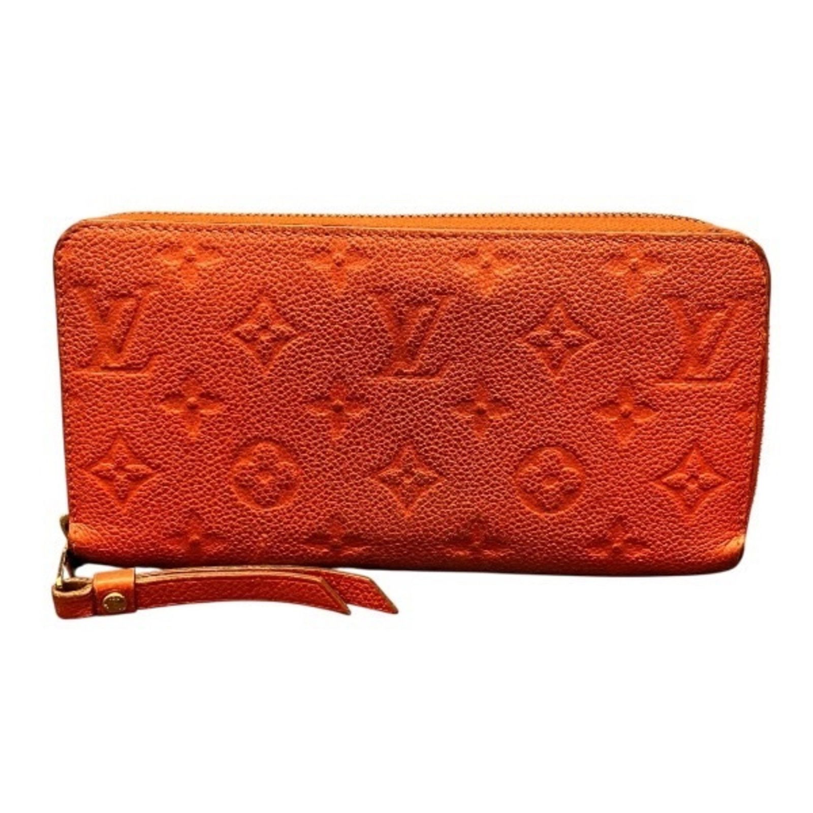Red Canvas Zippy Wallet by Louis Vuitton with 10cm x 19cm Size: Red Canvas Zippy Wallet by Louis Vuitton with 10cm x 19cm Size This Louis Vuitton Zippy wallet features a red canvas exterior and is designed for use by any gender. The wallet shows slight signs of us