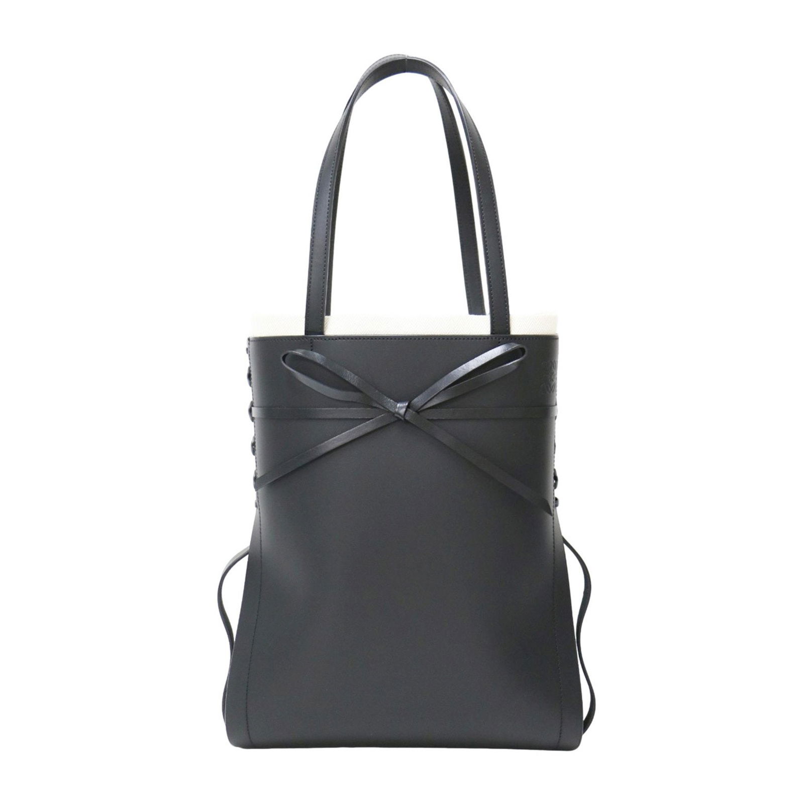 Loewe Ikebana Black Leather Tote Bag from Spain: Loewe Ikebana Black Leather Tote Bag from Spain The Loewe Ikebana is a women's leather bag in black, crafted in Spain. It features a spacious design with minor signs of use, including slight stains on