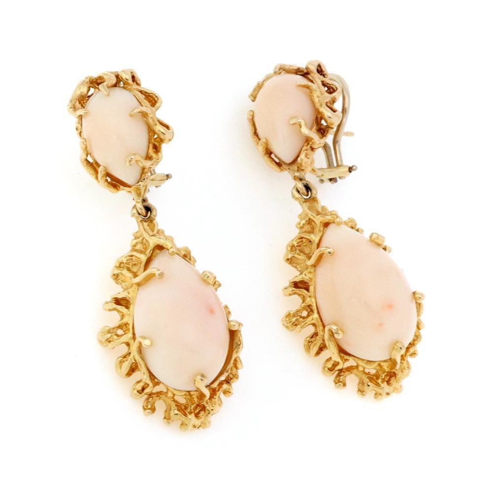 Estate 14k Yellow Gold Angel Skin Coral Dangle Earrings: Estate 14k Yellow Gold Angel Skin Coral Dangle Earrings Discover the elegance of these Estate Angel Skin Coral Drop Dangle Earrings, beautifully crafted from 14k yellow gold. The earrings feature a un