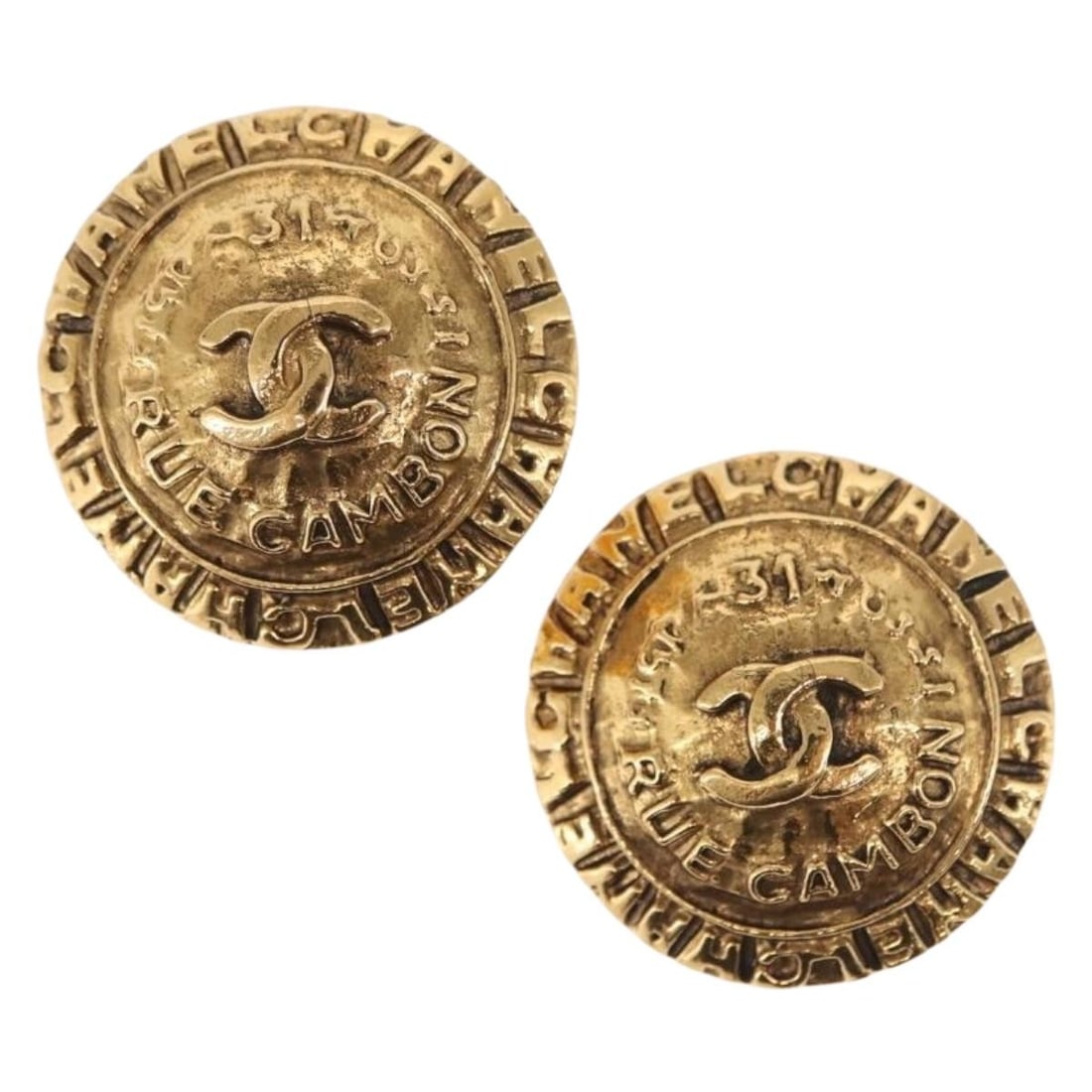 Gold Tone Metal CC Earrings by CHANEL Made in France: Gold Tone Metal CC Earrings by CHANEL Made in France This is an authentic pair of CHANEL earrings crafted from metal with a gold-tone finish. The design features the iconic CC logo. Made in France, th