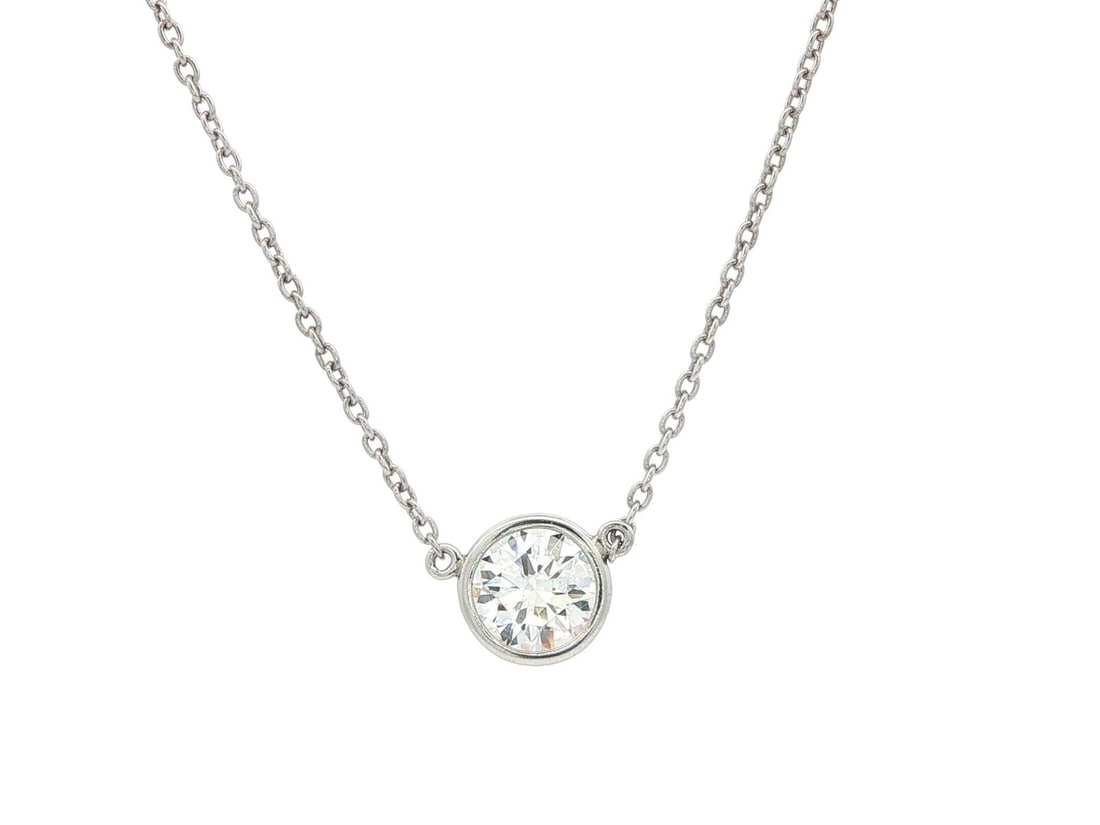 Platinum Necklace with GIA Certified 1.21ct G VS1 Round Diamond Pendant: Platinum Necklace with GIA Certified 1.21ct G VS1 Round Diamond Pendant This classic pendant necklace features a natural round brilliant cut diamond, bezel set in solid platinum. The diamond is GIA ce