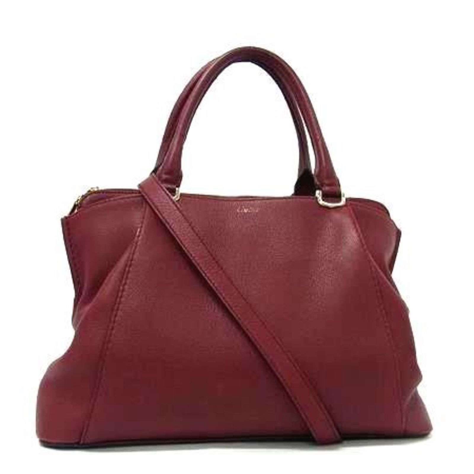 Burgundy Leather Tote Bag Cartier C de Cartier Model for Women: Burgundy Leather Tote Bag Cartier C de Cartier Model for Women This Cartier C de Cartier handbag is crafted from burgundy leather and designed for women. It is made in Italy and features dimensions of