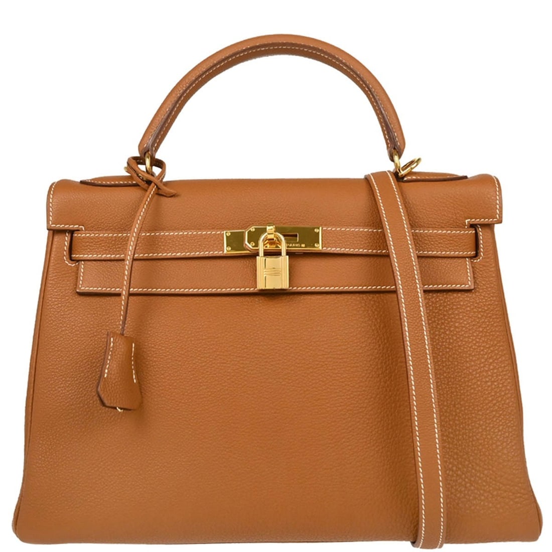 Hermes Kelly 32 Retourne Gold Togo Leather Handbag with Turn Lock: Hermes Kelly 32 Retourne Gold Togo Leather Handbag with Turn Lock Introducing the exquisite Hermes Kelly 32 Retourne Handbag, a luxurious addition to any collection. This medium-sized bag is crafted f