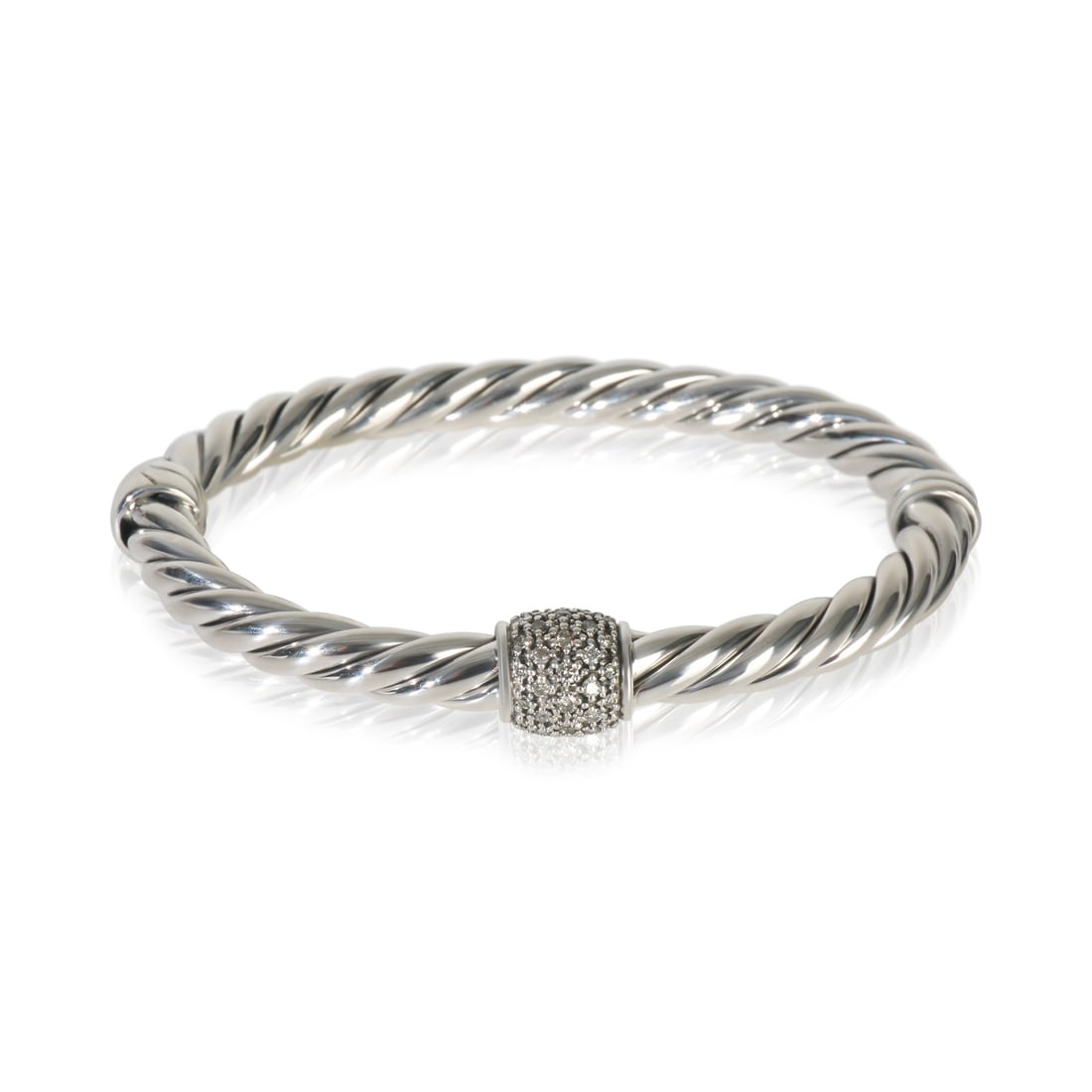 Metro Hinged Diamond Bracelet in Sterling Silver by David Yurman: Metro Hinged Diamond Bracelet in Sterling Silver by David Yurman This pre-owned David Yurman Metro Hinged bracelet is crafted from sterling silver and features round brilliant white diamonds with a to