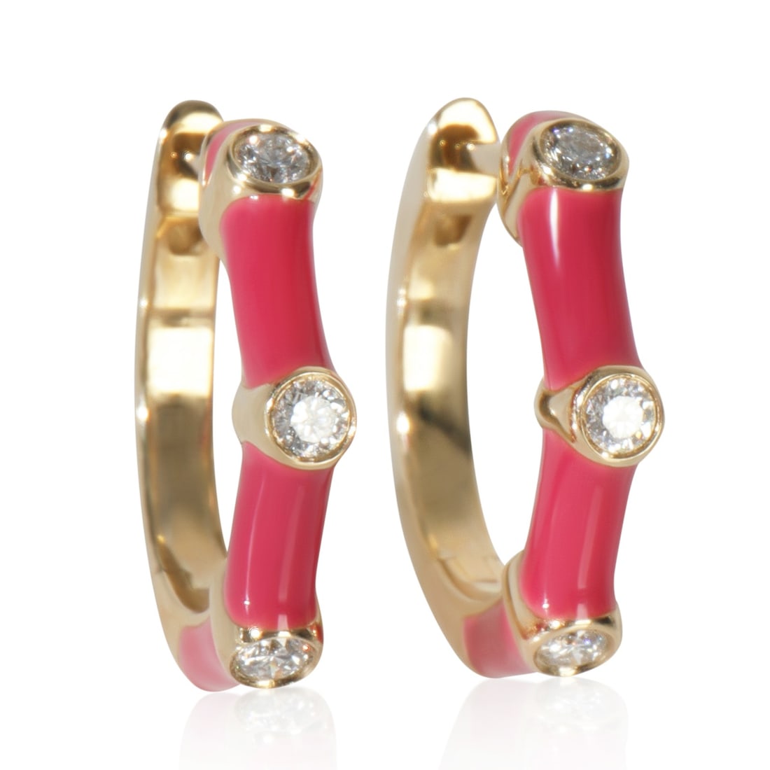 14K Yellow Gold Fuchsia Enamel Diamond Huggie Earrings: 14K Yellow Gold Fuchsia Enamel Diamond Huggie Earrings Elevate your accessory collection with these stunning Yellow Gold Diamond Fuchsia Enamel Huggie Earrings. Expertly crafted in 14K yellow gold, th