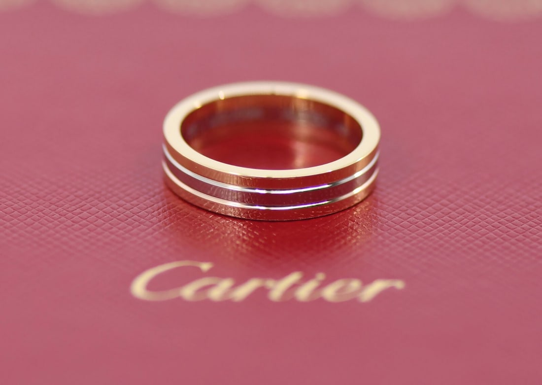 Cartier Vendome 18K Tri Gold Ring with Certificate Size 55: Cartier Vendome 18K Tri Gold Ring with Certificate Size 55 This exquisite Cartier Vendome ring features a stunning multi-tone gold design, crafted from high-quality 18k gold. The ring is a US size 7.2