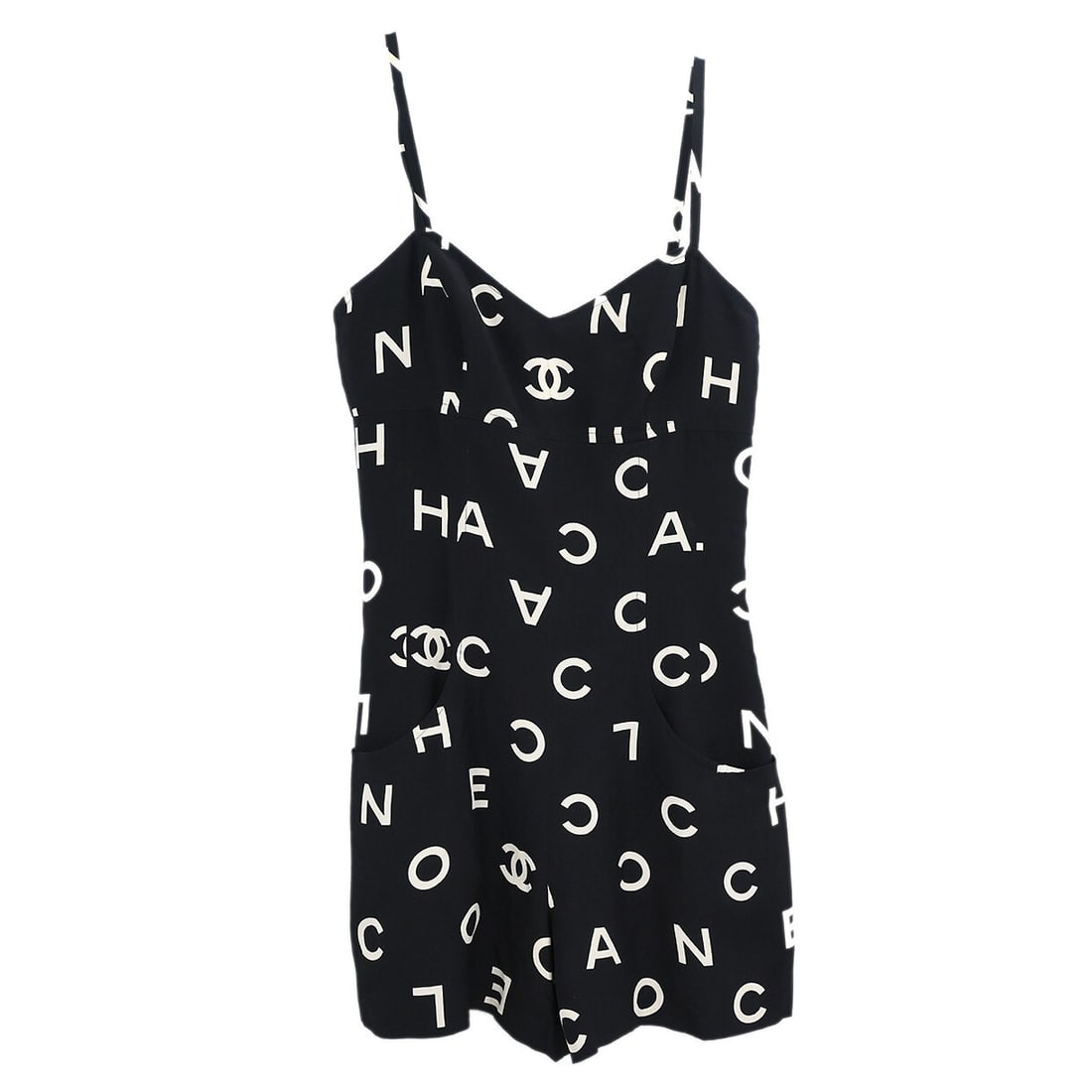 Chanel Vintage Black Silk Sleeveless Mini Dress 36 with Logo Accent: Chanel Vintage Black Silk Sleeveless Mini Dress 36 with Logo Accent Elevate your summer wardrobe with this vintage Chanel sleeveless dress. Crafted from luxurious 100% silk, this short, mini dress in