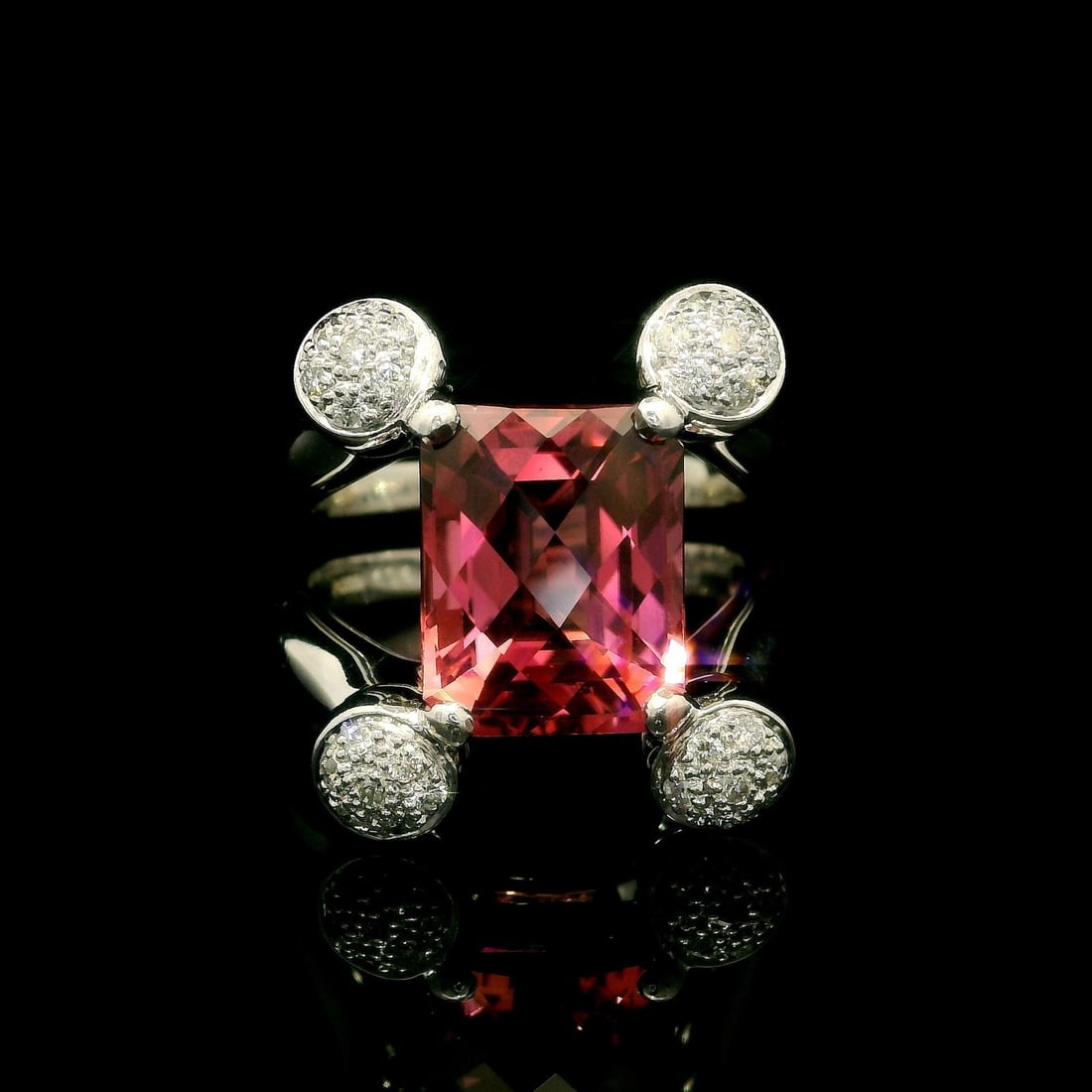 Platinum 5.2ct Pink Tourmaline Diamond Split Shank Cocktail Ring: Platinum 5.2ct Pink Tourmaline Diamond Split Shank Cocktail Ring This exquisite cocktail ring features a stunning natural pink tourmaline at its center, enhanced by a halo of sparkling diamonds. The c