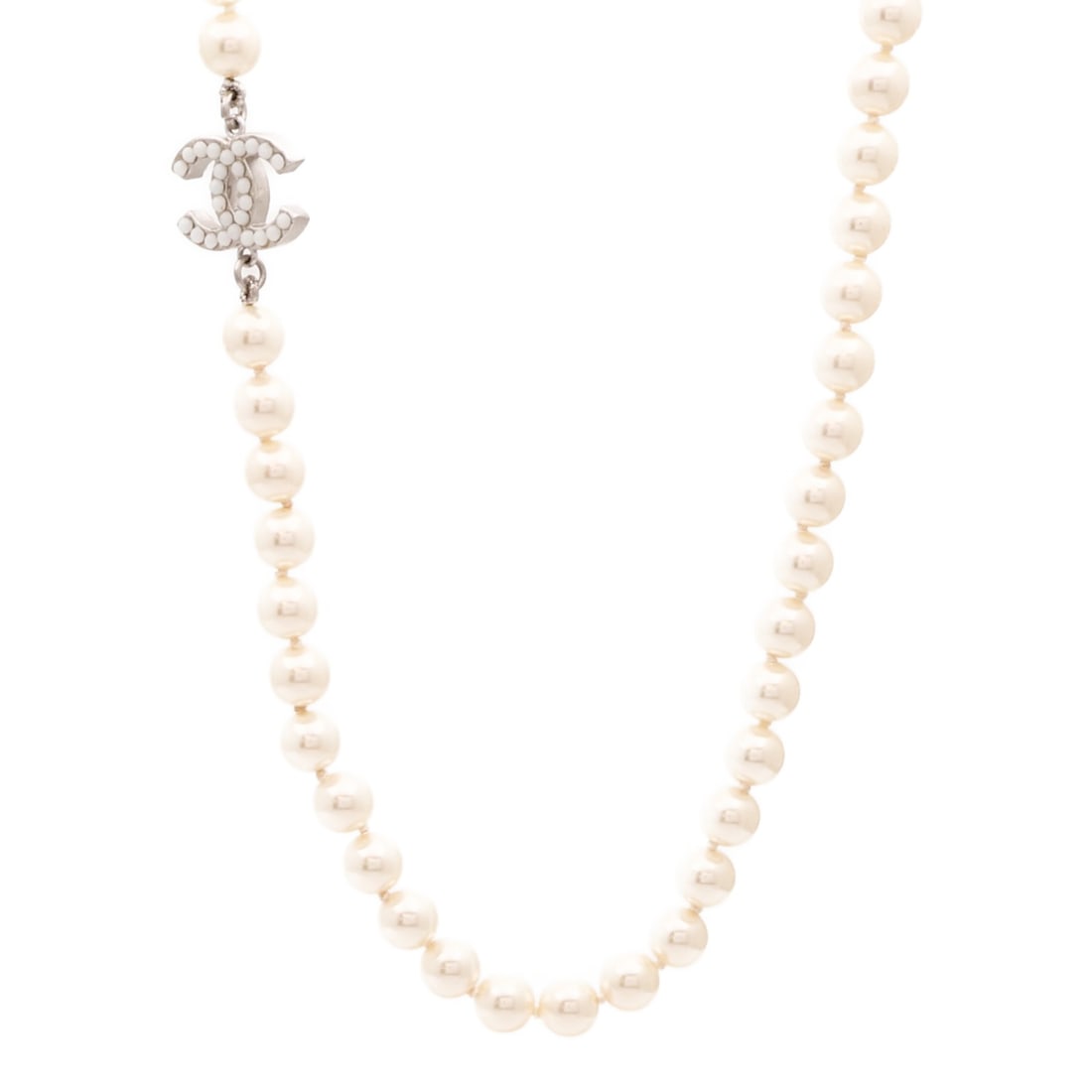 White PVC CC Pendant Necklace by Chanel: White PVC CC Pendant Necklace by Chanel This CHANEL CC necklace features a distinctive design crafted from white PVC with metal components. The necklace does not contain any gemstones and is designed