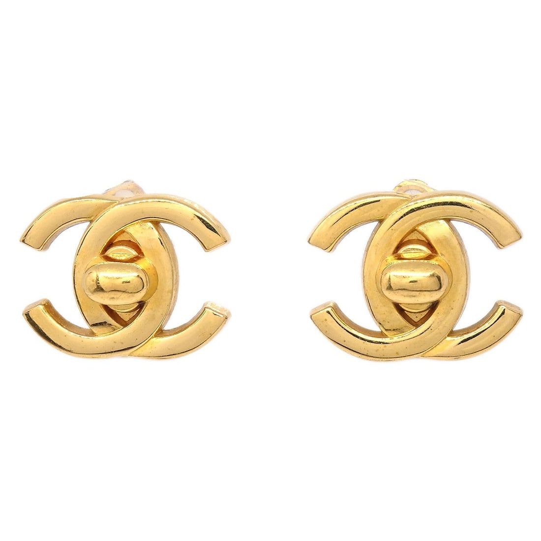 Large Gold Plated Clip-On Turnlock Earrings Chanel CC 95A: Large Gold Plated Clip-On Turnlock Earrings Chanel CC 95A These Chanel CC Turnlock earrings feature a large gold-plated design with clip-on closures. Showcasing the iconic turnlock style, these earrin