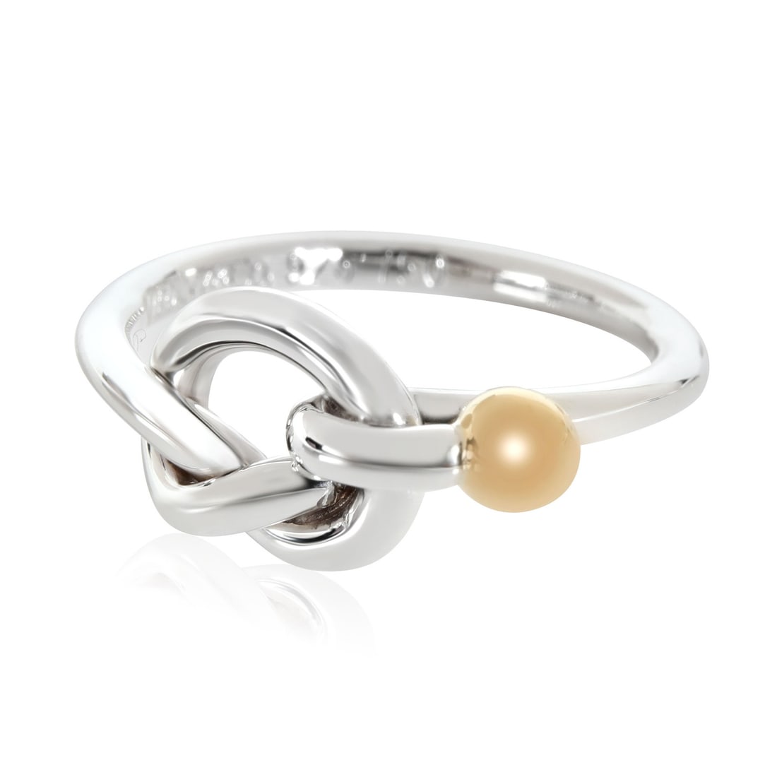 Love Knot Ring in 18k Yellow Gold and Sterling Silver Size 6: Love Knot Ring in 18k Yellow Gold and Sterling Silver Size 6 This Tiffany & Co. Love Knot ring is crafted in 18k yellow gold and sterling silver. Designed for women, it features a distinctive knot mot