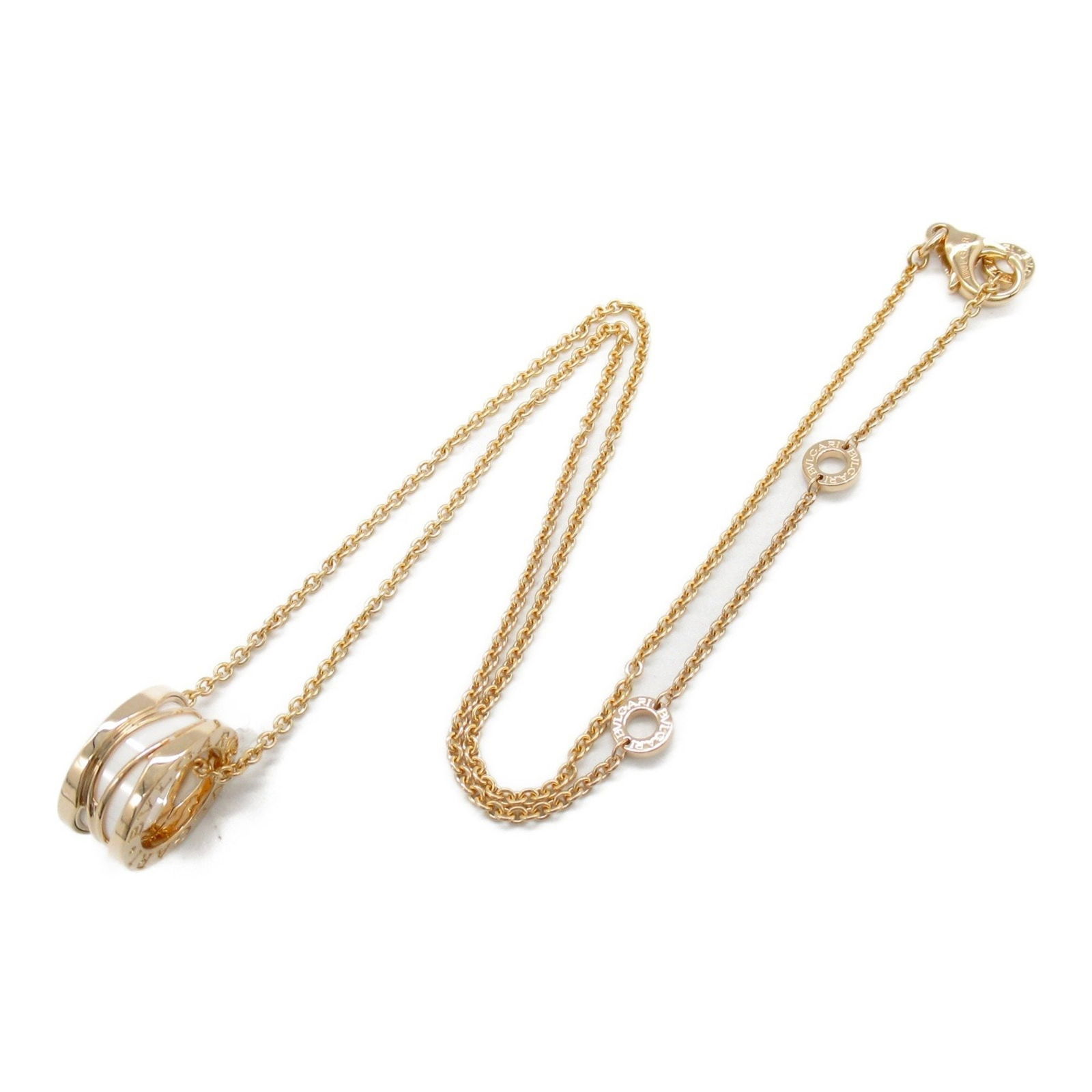 Rose Gold Bulgari B.Zero1 Necklace with Adjustable Chain: Rose Gold Bulgari B.Zero1 Necklace with Adjustable Chain This Bulgari B.Zero1 necklace features a rose gold construction with a gold color finish. Designed for women, it showcases a pendant measuring