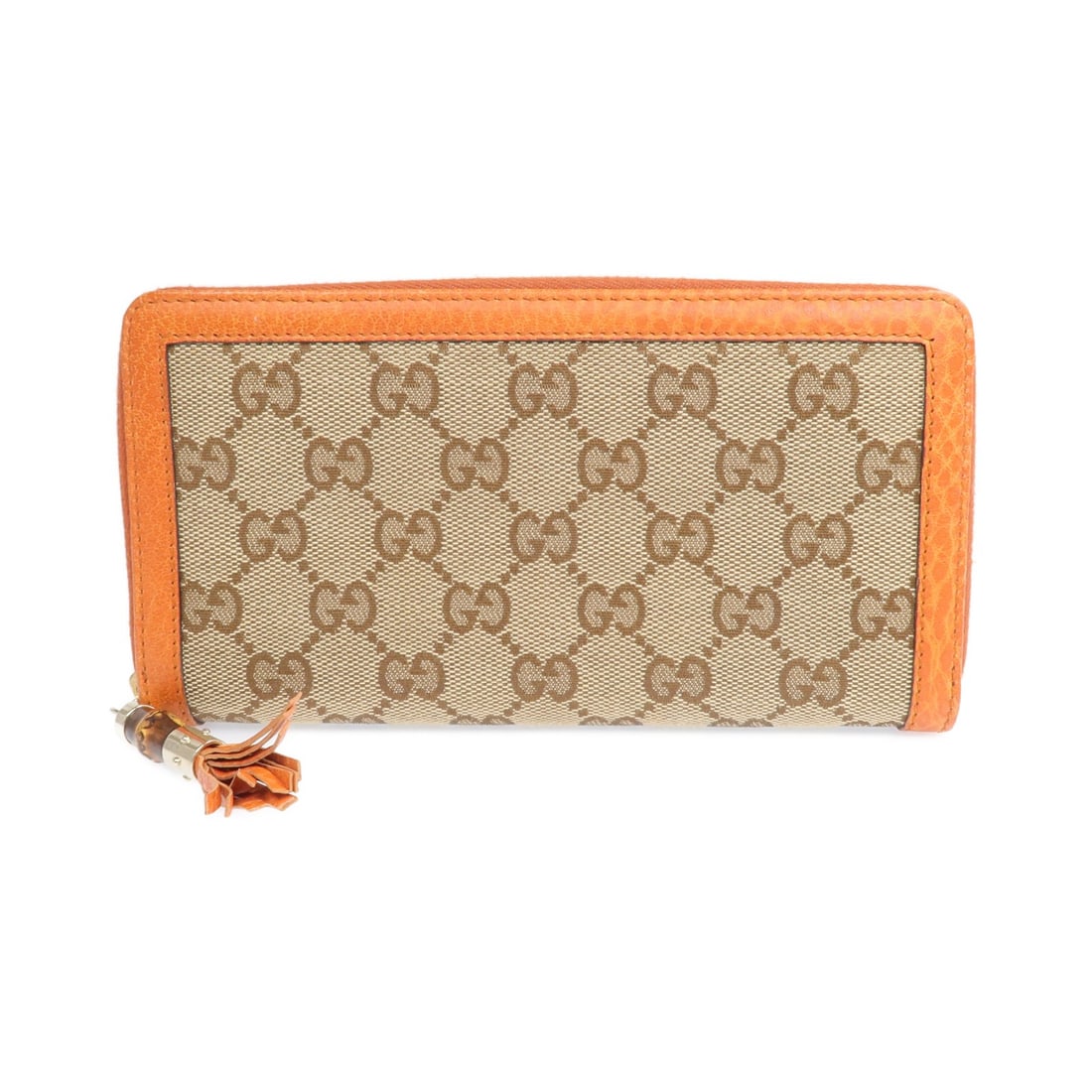 Gucci GG Canvas Zip Around Long Wallet with Gold Tone Hardware Orange: Gucci GG Canvas Zip Around Long Wallet with Gold Tone Hardware Orange This Gucci around long wallet features the iconic GG canvas in an orange and brown color scheme. Crafted in Italy, it offers a sty