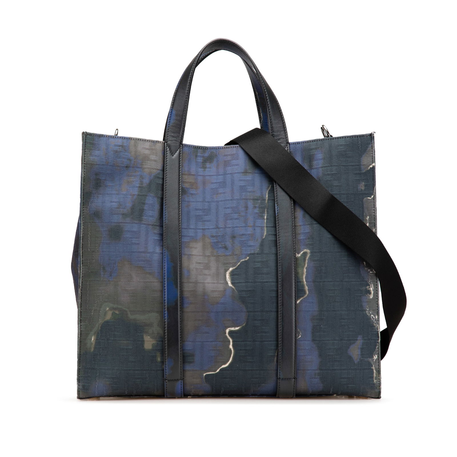 Fendi Large Zucca Tie Dye Shopper Tote Blue Fabric Italy: Fendi Large Zucca Tie Dye Shopper Tote Blue Fabric Italy The Fendi Large Zucca Jacquard Tie Dye Sunset Shopper Tote is a stylish satchel crafted from a jacquard fabric body, complemented by leather tr