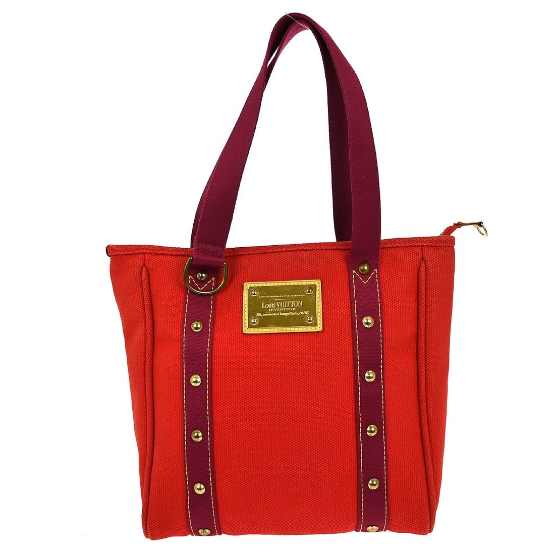 Louis Vuitton Antigua Cabas MM Canvas Tote Red with Purple Accents M40034: Louis Vuitton Antigua Cabas MM Canvas Tote Red with Purple Accents M40034 This Louis Vuitton Antigua Cabas MM Tote Bag features a striking red exterior complemented by a vibrant purple lining and hand