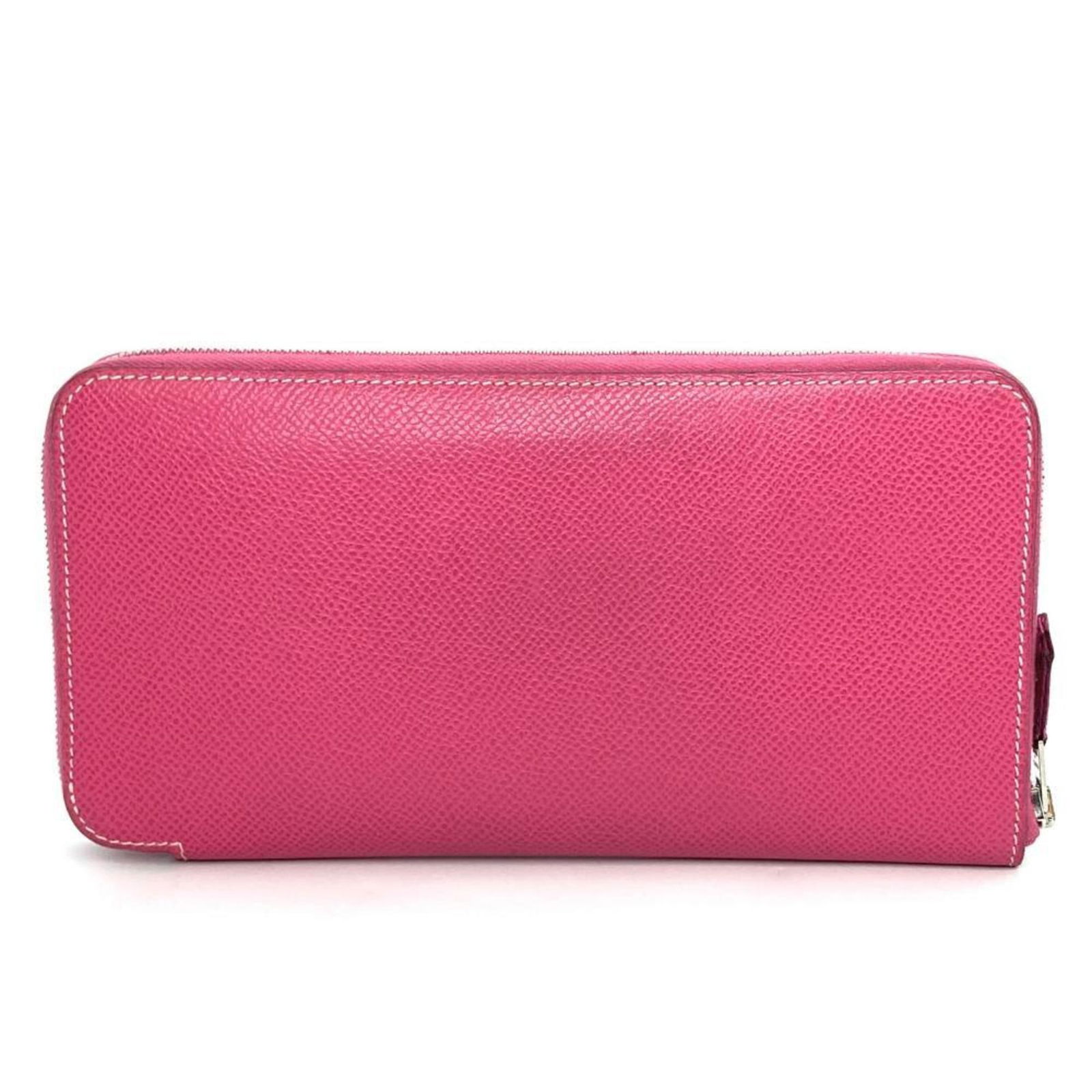 Pink Leather Silk'In Wallet by Hermes: Pink Leather Silk'In Wallet by Hermes The Hermes Silk'In is a women's wallet crafted from leather in a pink hue. Made in France, it features a spacious design suitable for organizing essentials. The w