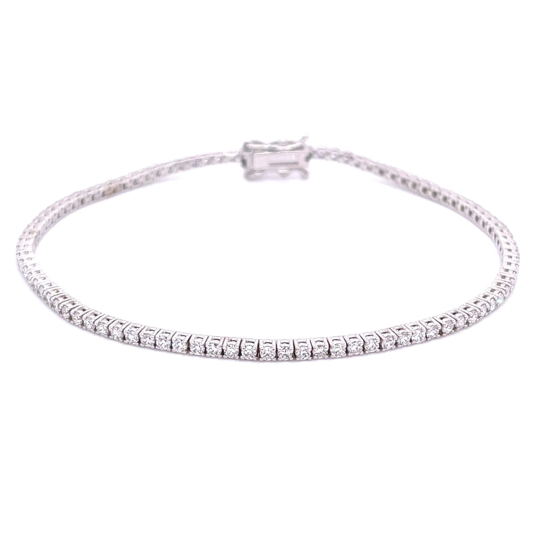 14K White Gold Diamond Tennis Bracelet 1.75 CTW Unisex: 14K White Gold Diamond Tennis Bracelet 1.75 CTW Unisex This exquisite Diamond Tennis Bracelet features a stunning array of round diamonds set in luxurious 14K white gold. With a total carat weight of