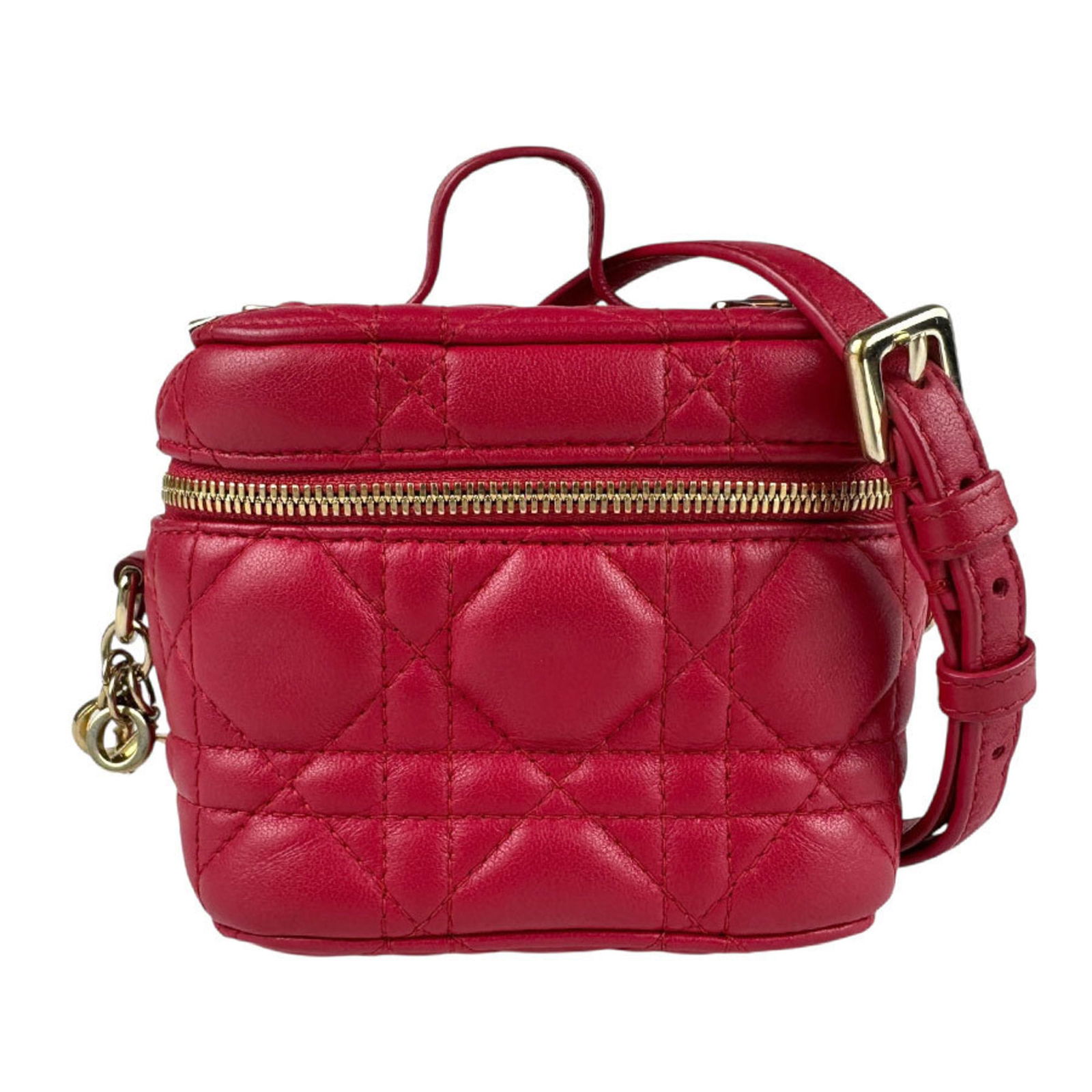 Red Leather Vanity Case by Dior Italy: Red Leather Vanity Case by Dior Italy This Dior Vanity case features a red leather exterior and a compact design, crafted for women. It is made in Italy and includes a top handle. The exterior shows s