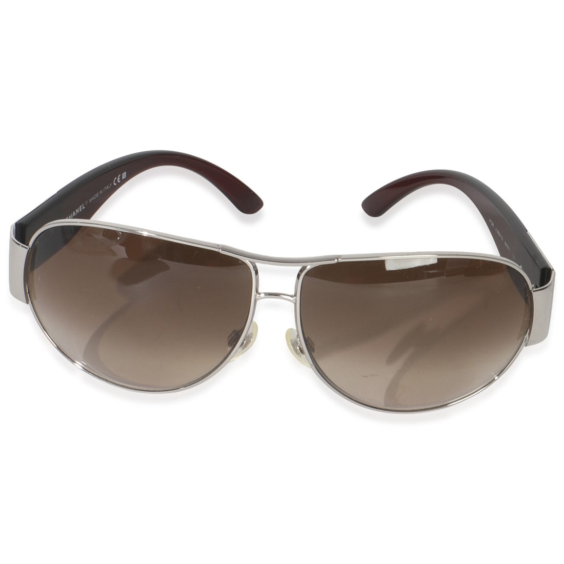 Aviator Sunglasses by Chanel with Brown and Gold-Tone Frames CC Logo: Aviator Sunglasses by Chanel with Brown and Gold-Tone Frames CC Logo These Chanel aviator sunglasses feature a brown and silver-tone frame with signature CC logo accents. Designed in Italy, they offer